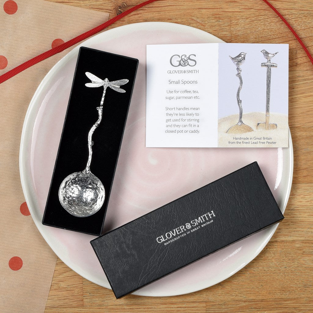 A small spoon pewter sugar spoon with a dragonfly on the end of a twig handle. Unusual, useful and tactile dragonfly gifts handmade in the UK
