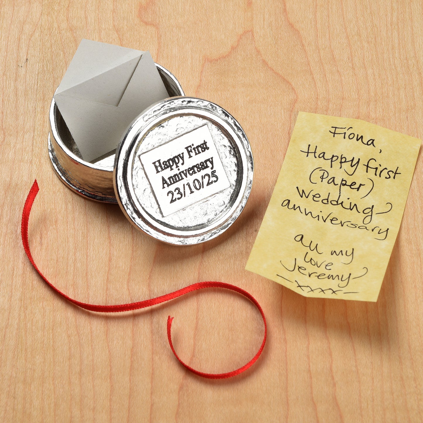 Heart wedding anniversary pewter personalised trinket box gift. Our round anniversary keepsake box features a heart sculpture as a handle. The underside of the lid can be engraved with your message. A perfect tin ten year anniversary gift (Our pewter is 95% tin)