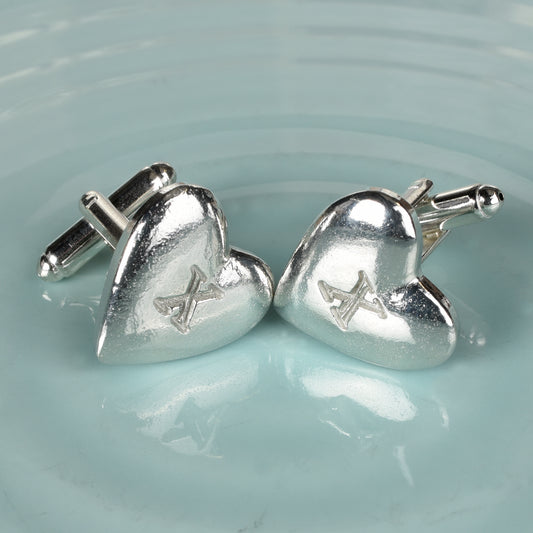 Stylish and elegant pewter heart cufflinks with a X (signifying 10) engraved onto the front on high quality silver plated cufflink fittings. UK made with love and care. The perfect 10 year anniversary gift for him - tin anniversary gifts and a great gift for Father's Day.
