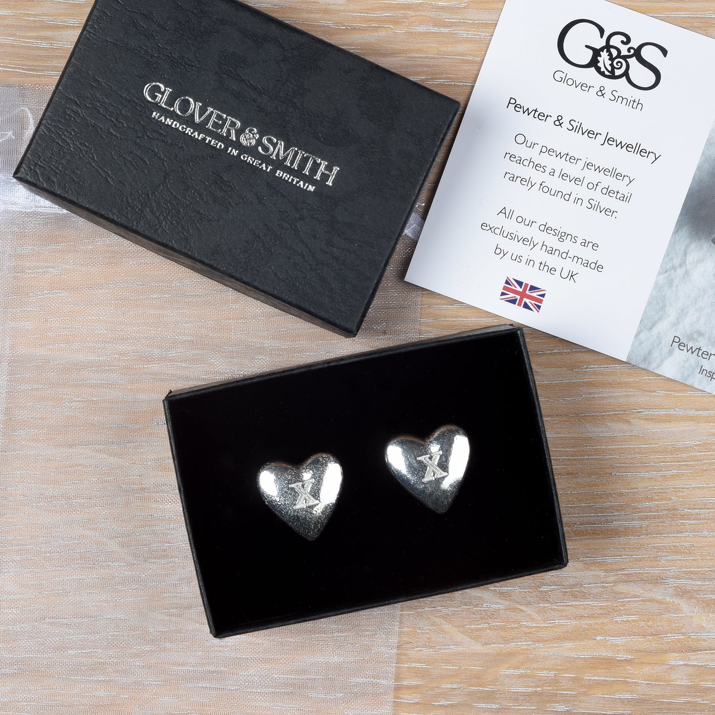 Stylish and elegant pewter heart cufflinks with a X (signifying 10) engraved onto the front on high quality silver plated cufflink fittings. UK made with love and care. The perfect 10 year anniversary gift for him - tin anniversary gifts and a great gift for Father's Day.
