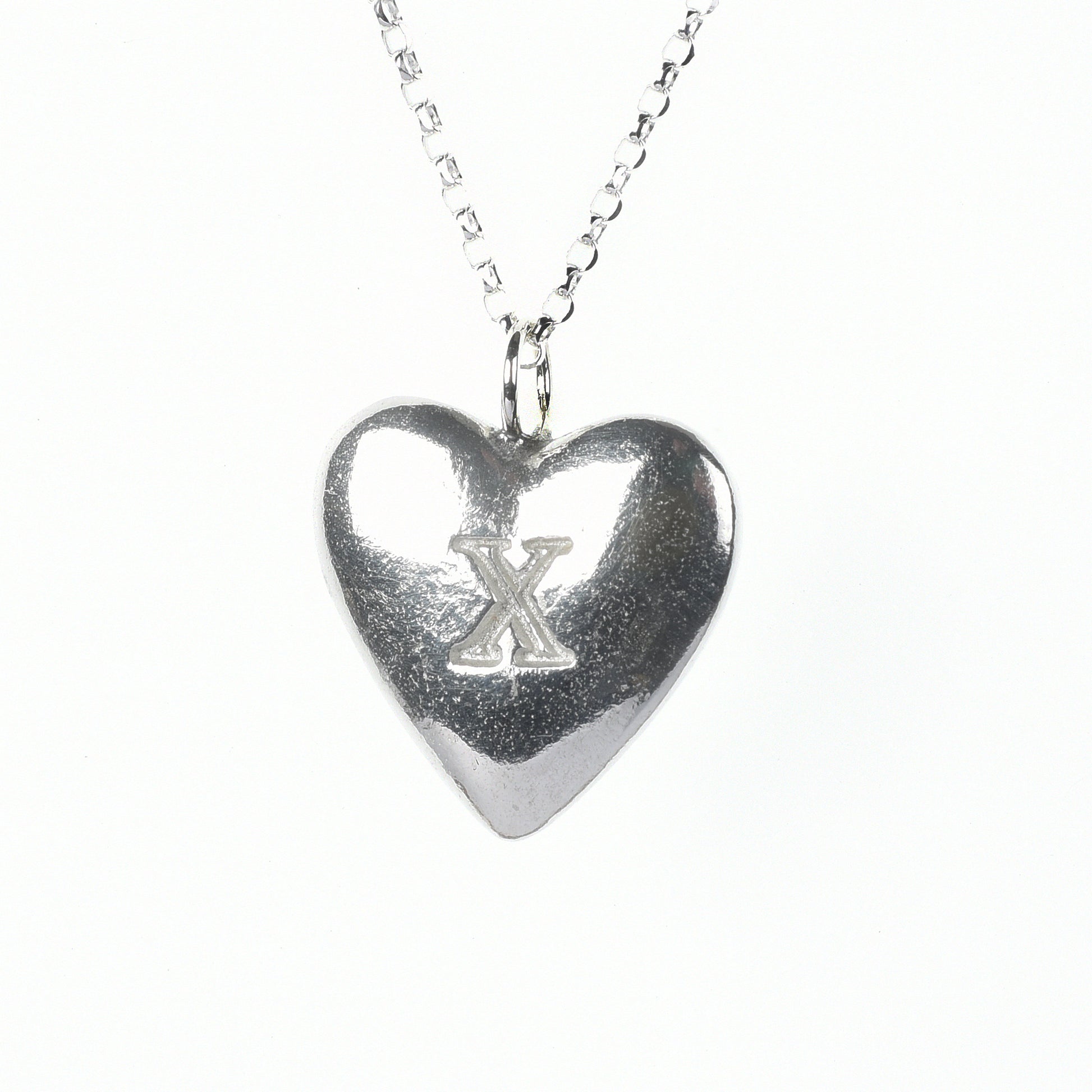 10th Anniversary gifts for her, tin gifts. A stylish and elegant pewter heart necklace with a X (signifying 10) engraved onto one side on an 18 inch Sterling silver chain.