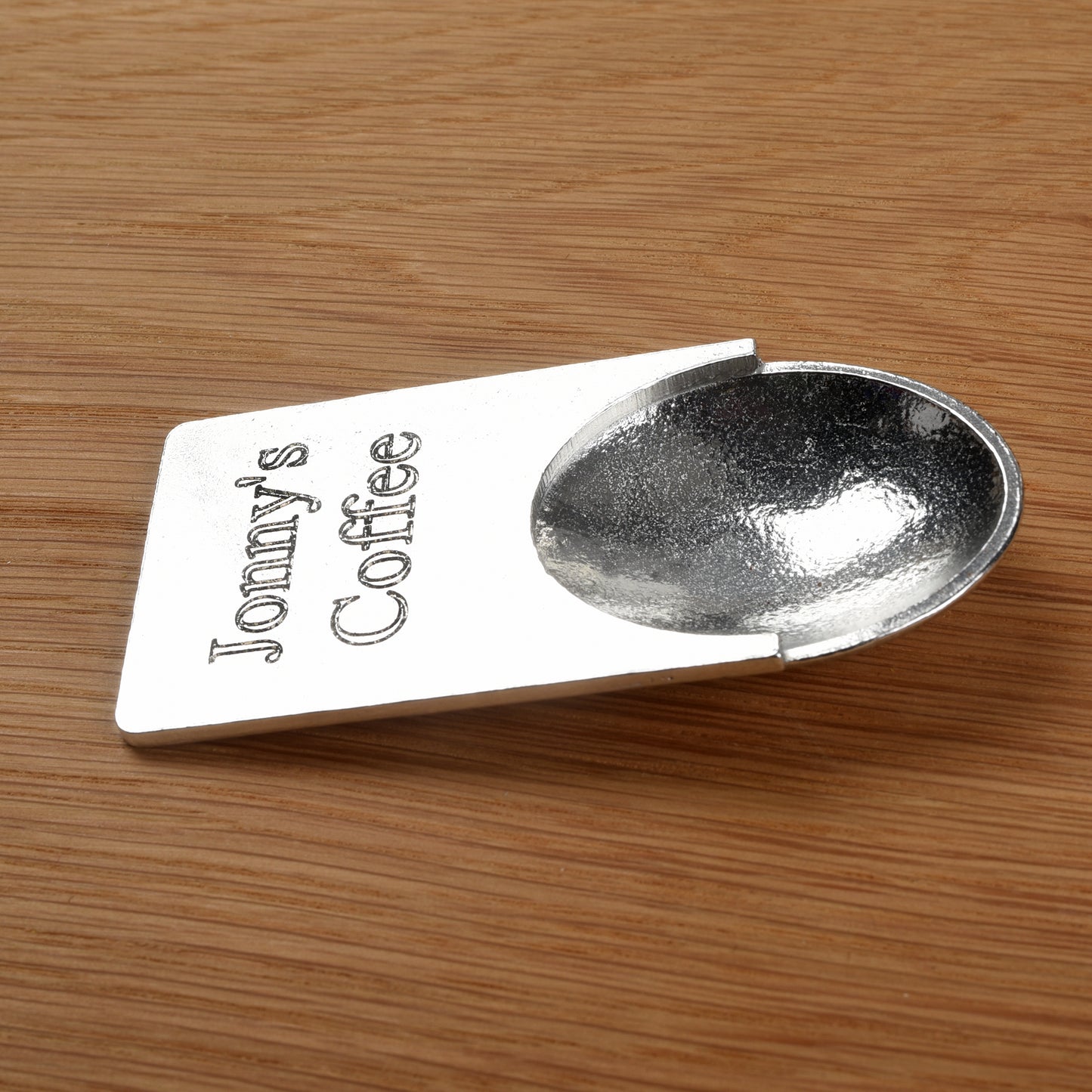 A personalised engraved pewter coffee measure scoop spoon, sugar spoon, tea caddy spoon. You decide the message engraved on the front
