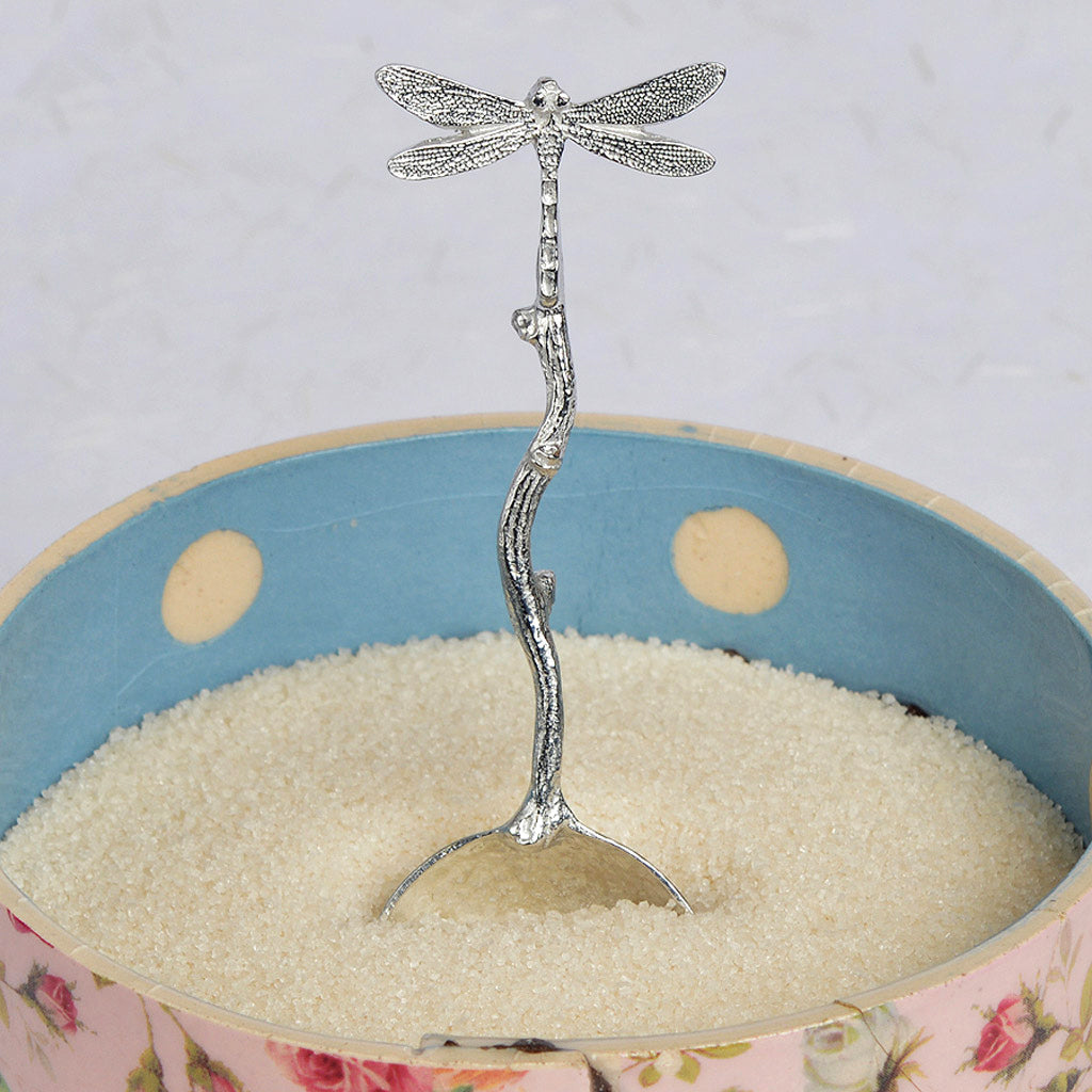 A small spoon pewter sugar spoon with a dragonfly on the end of a twig handle. Unusual, useful and tactile dragonfly gifts handmade in the UK