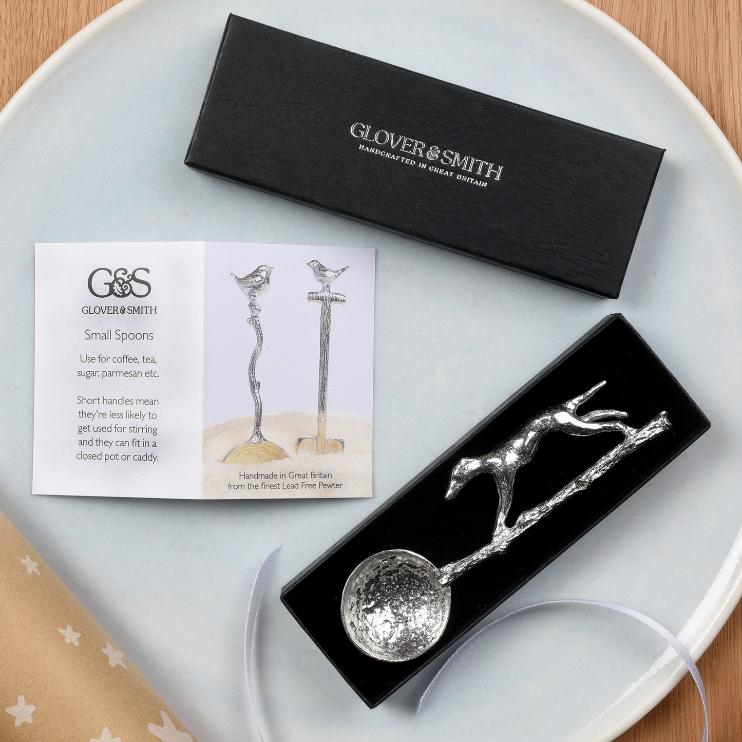 Greyhound pewter sugar spoon, A sleek greyhound runs along a branch to form the spoon handle. With a round spoon bowl. Gifts for dog lovers.