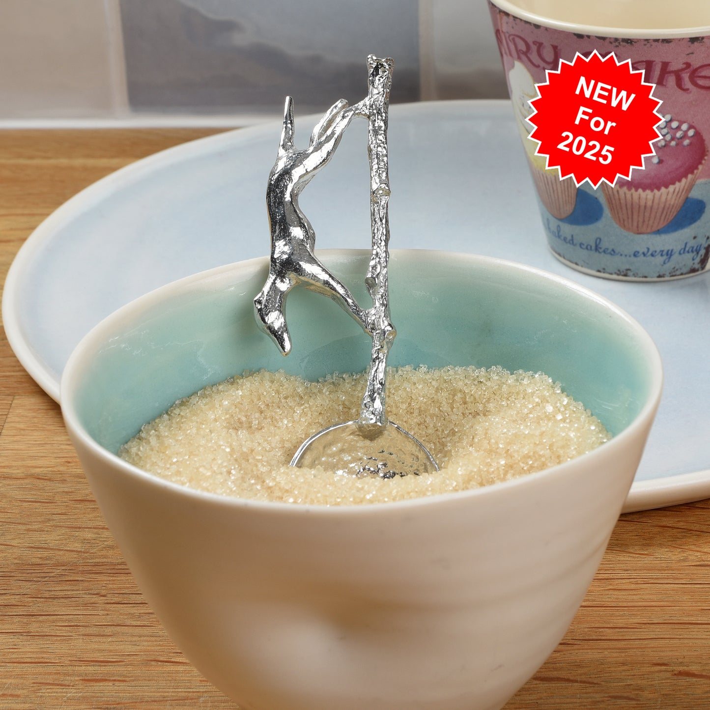 Greyhound pewter sugar spoon, A sleek greyhound runs along a branch to form the spoon handle. With a round spoon bowl. Gifts for dog lovers.