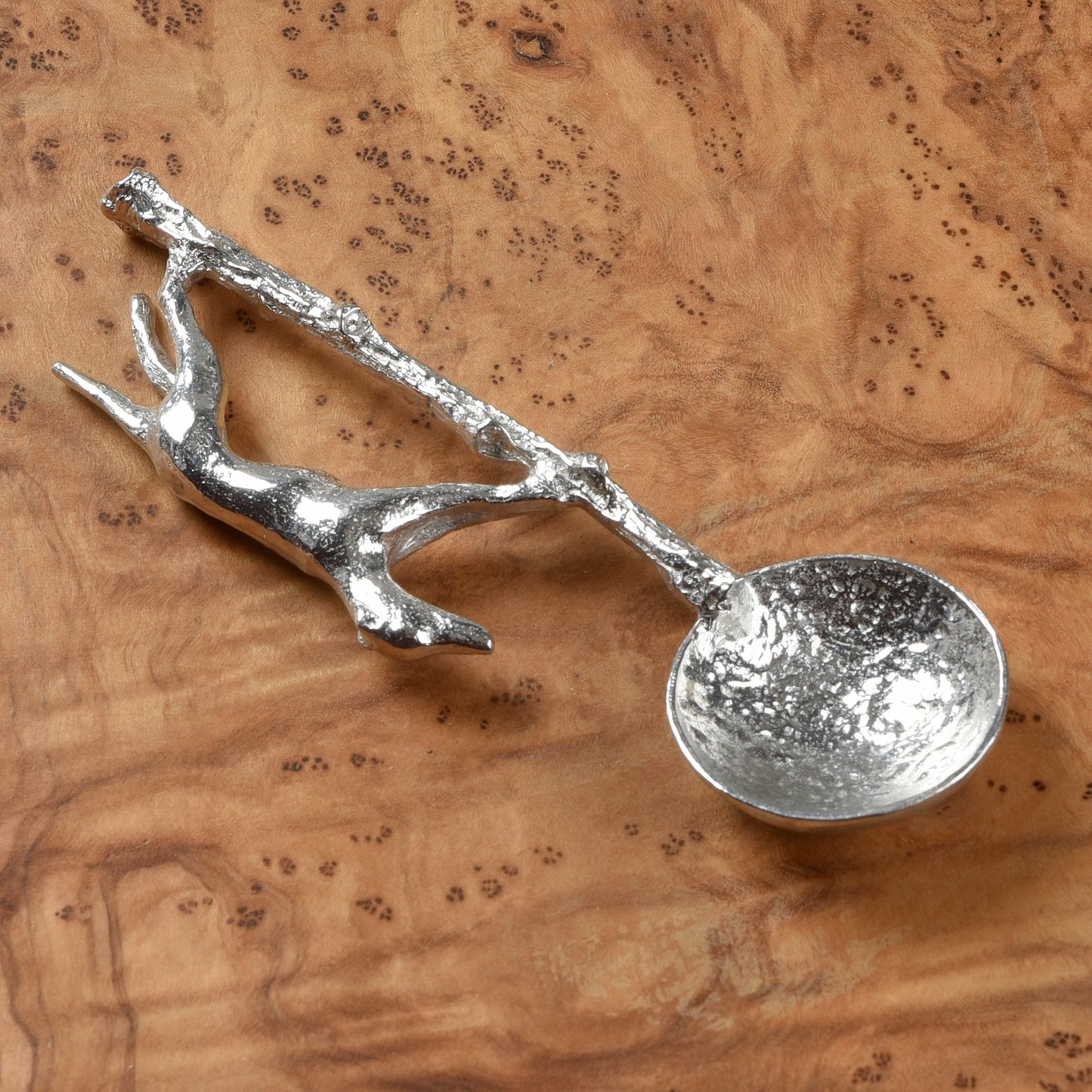 Greyhound pewter sugar spoon, A sleek greyhound runs along a branch to form the spoon handle. With a round spoon bowl. Gifts for dog lovers.