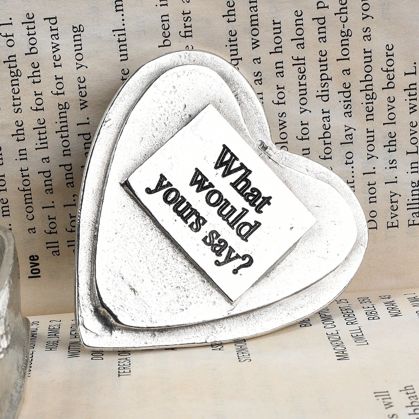 A personalised heart shaped pewter keepsake box with a garnet stone in the middle. The underside of the lid can be engraved with your personalised message. A perfect 10th (Tin) ten year wedding anniversary gift (Our pewter is 95% tin).