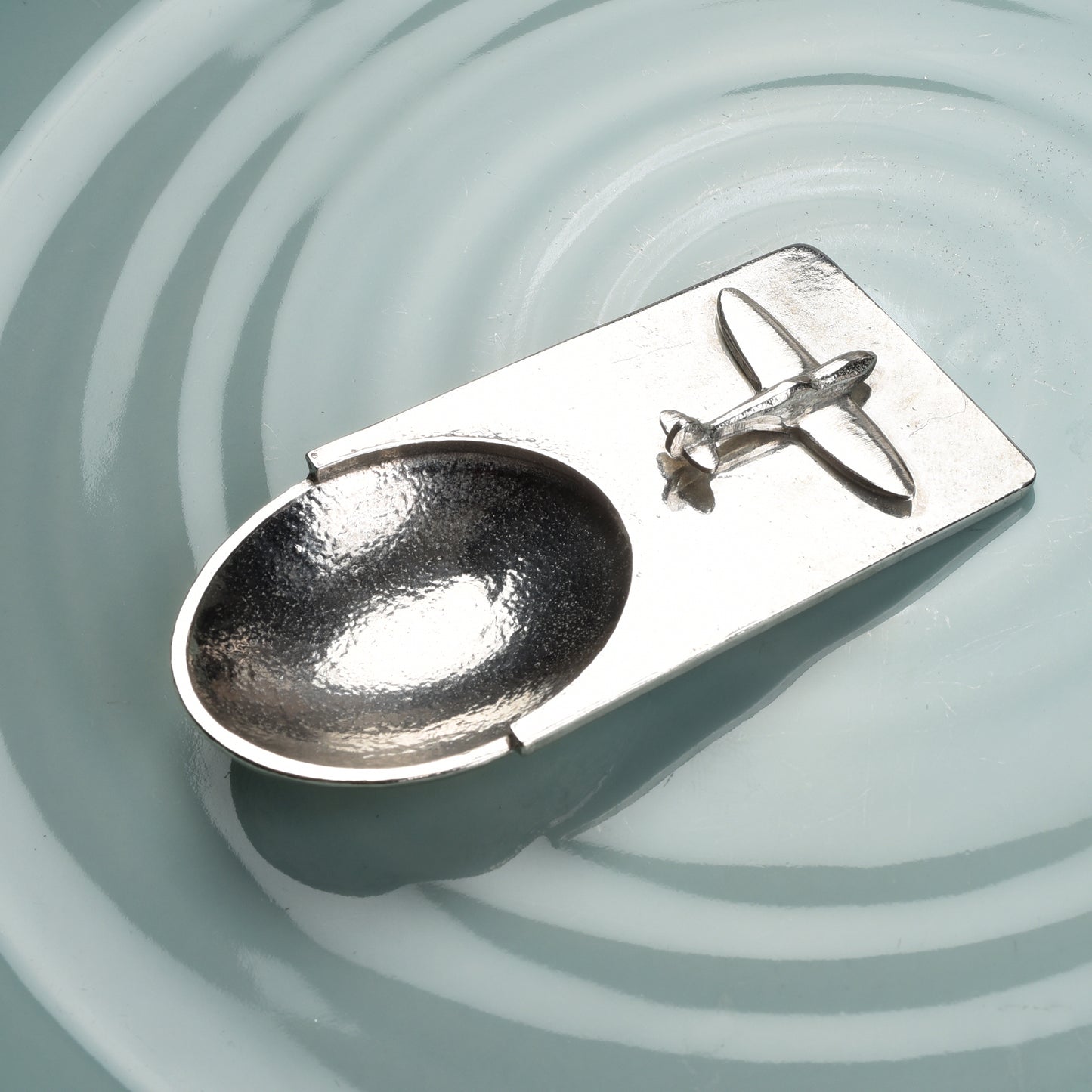 A personalised Spitfire pewter coffee measure scoop spoon. We engrave the back of this contemporary coffee spoon with your own personal message, name or date. The spoon can also be used as a tea caddy spoon or a sugar spoon.