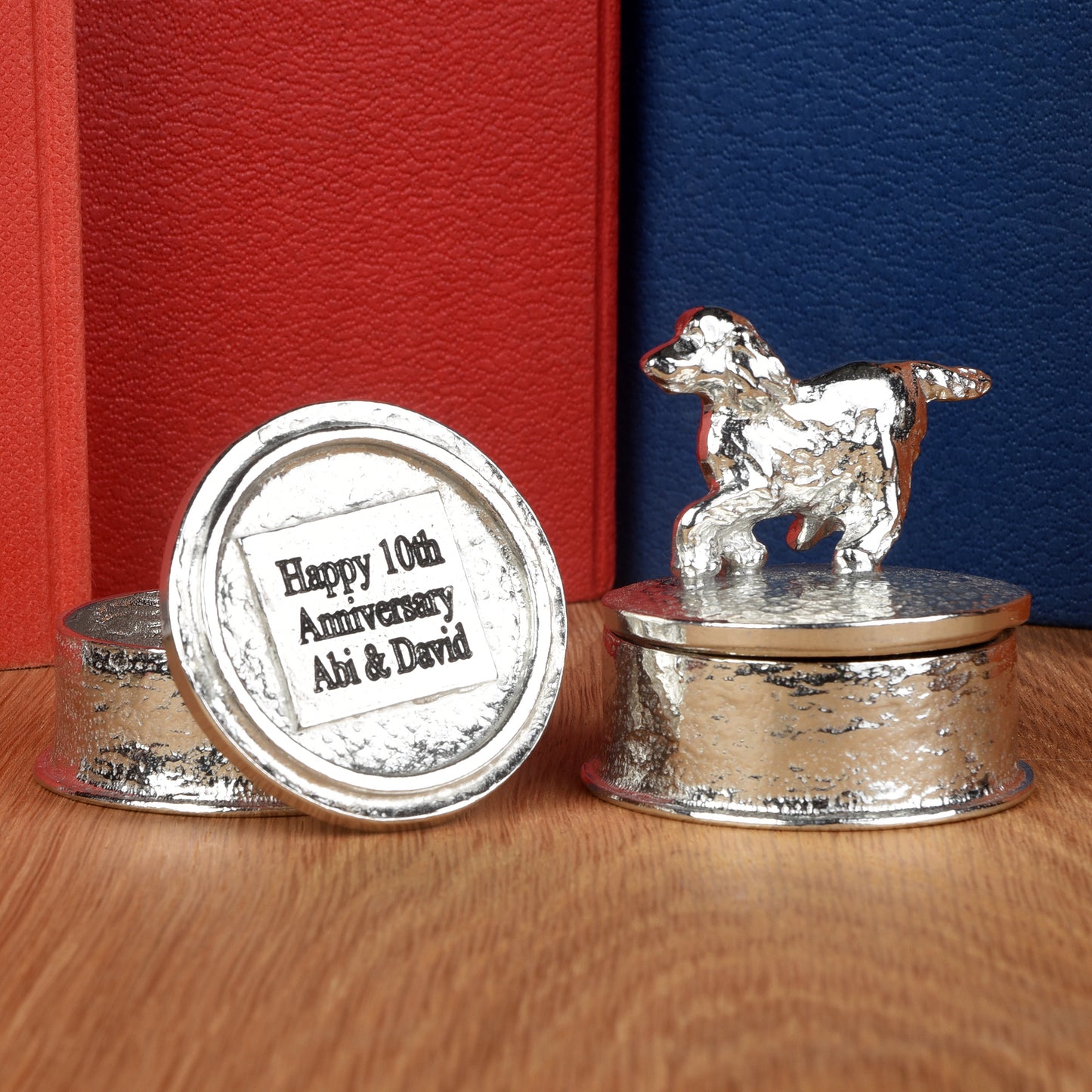 Spaniel pewter personalised trinket box. Our round spaniel keepsake box features a running springer spaniel sculpture as a handle. The underside of the lid can be engraved with your personalised message. Dog gifts, personalised gifts for dog lovers.