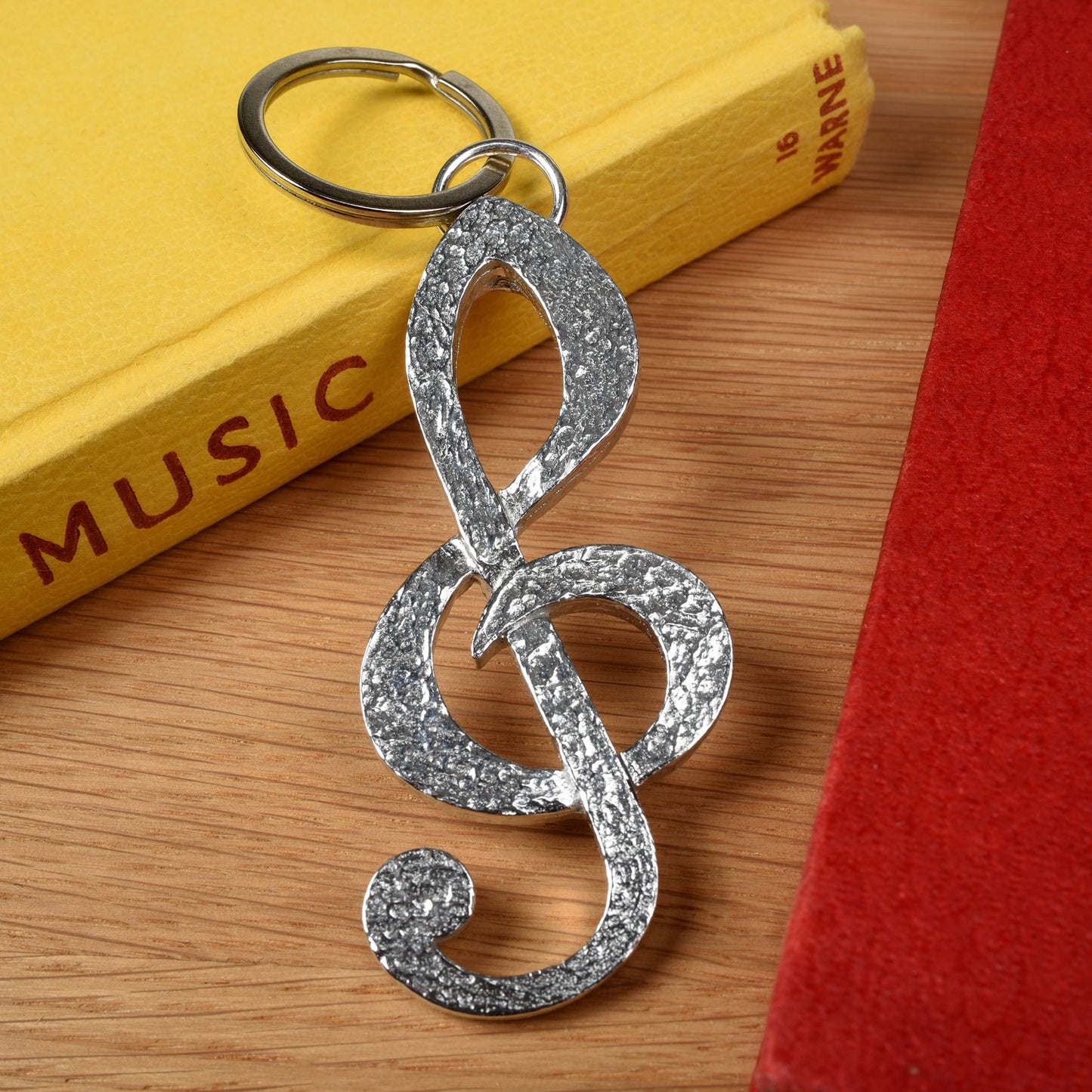 Treble clef pewter keyring or key chain 3 inches tall it makes the perfect gift for music lovers. Musical gifts handmade in the UK