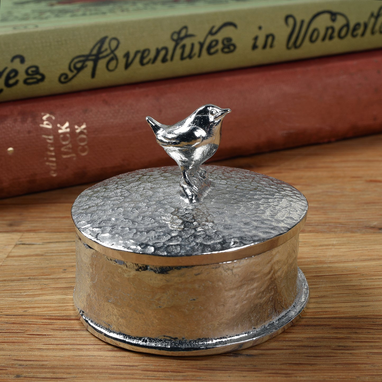 Wren pewter personalised trinket box. Our round wren keepsake box features a Jenny wren sculpture as a handle. The underside of the lid can be engraved with your personalised message.