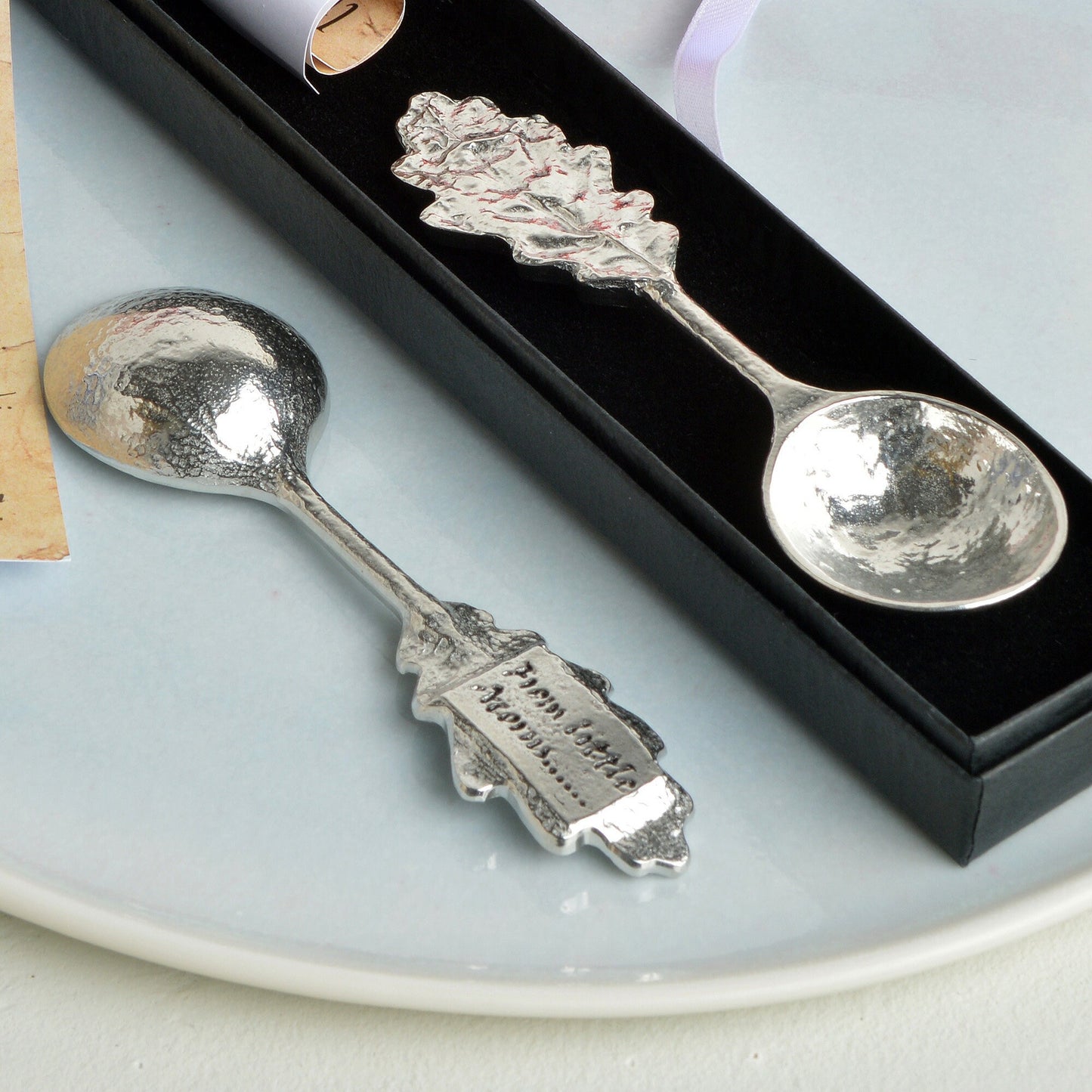 An oak leaf topped pewter spoon with the words 'From little acorns' on the reverse. Christening gifts for boys and girls. UK handmade.