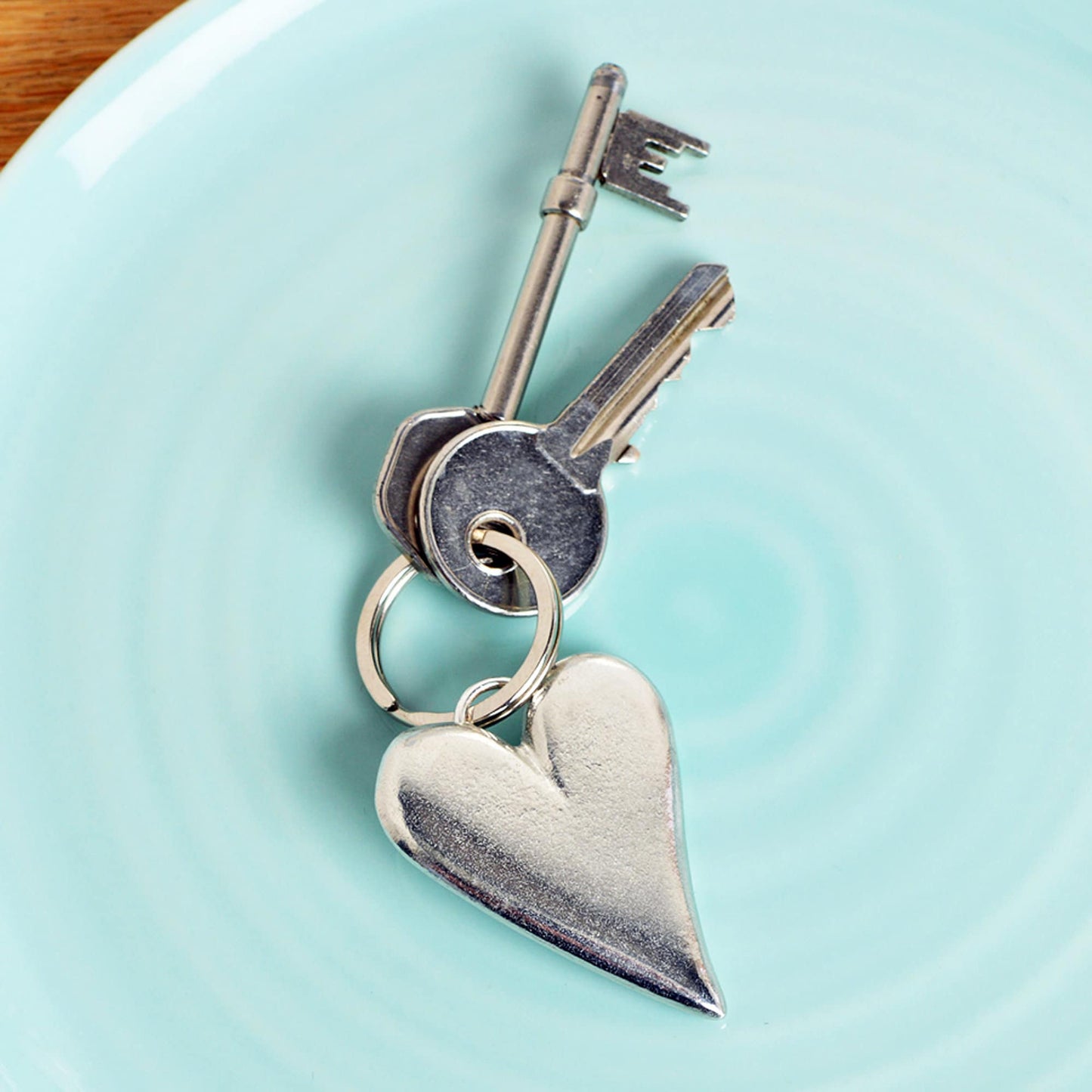 A solid pewter heart shaped keyring on a quality stainless steel ring. Love tokens, new home gifts, useful gifts, gifts for lovers, heart gifts, housewarming gifts, 10th tin ten year wedding anniversary gifts, small wedding gifts handmade in the UK