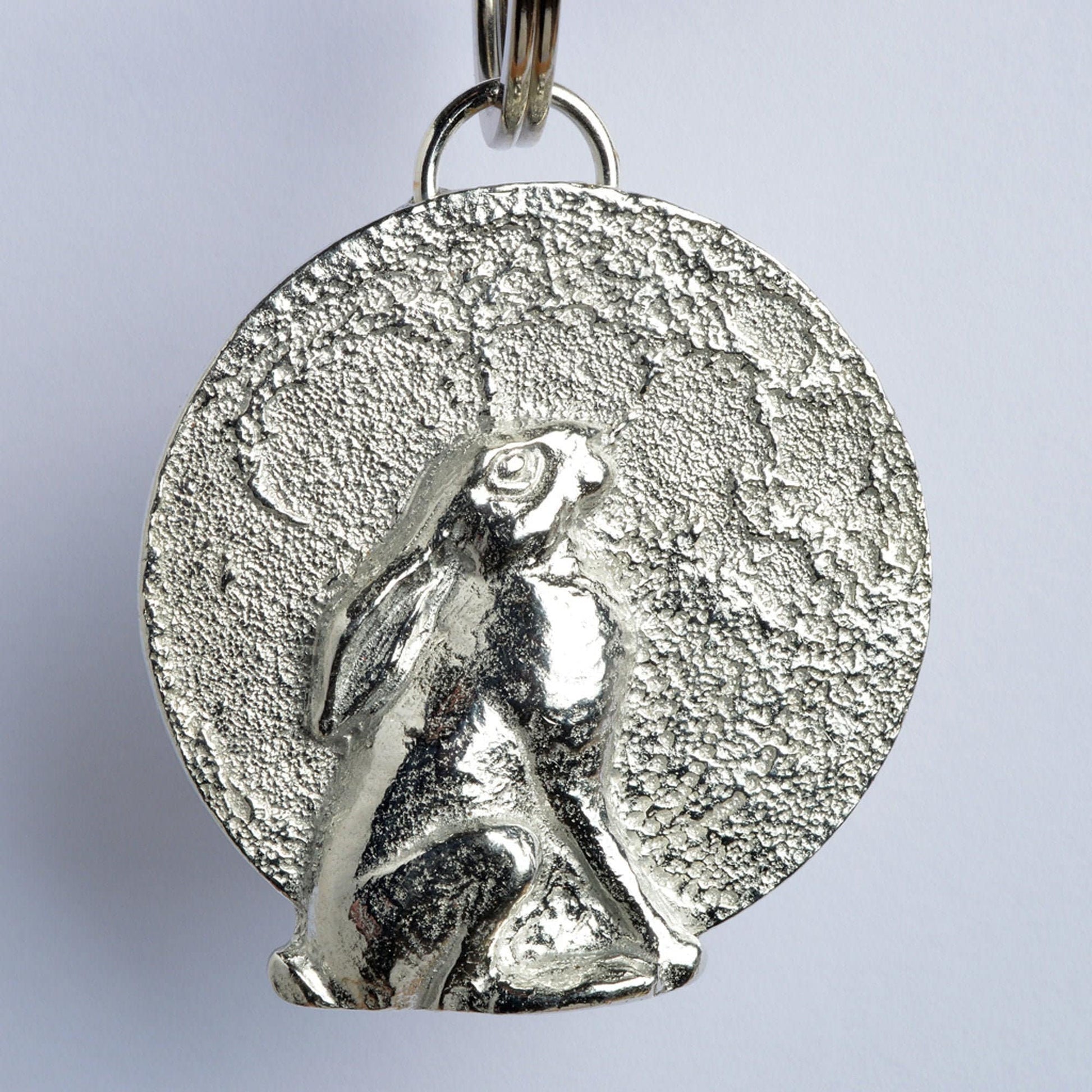 A hare gazes at a beautifully textured moon. Solid pewter hare keyring on a quality stainless steel ring. Hare gifts, gifts for hare lovers, Pewter keyring gifts. Housewarming gifts, moon staring hare keyring, moongazing hare gifts