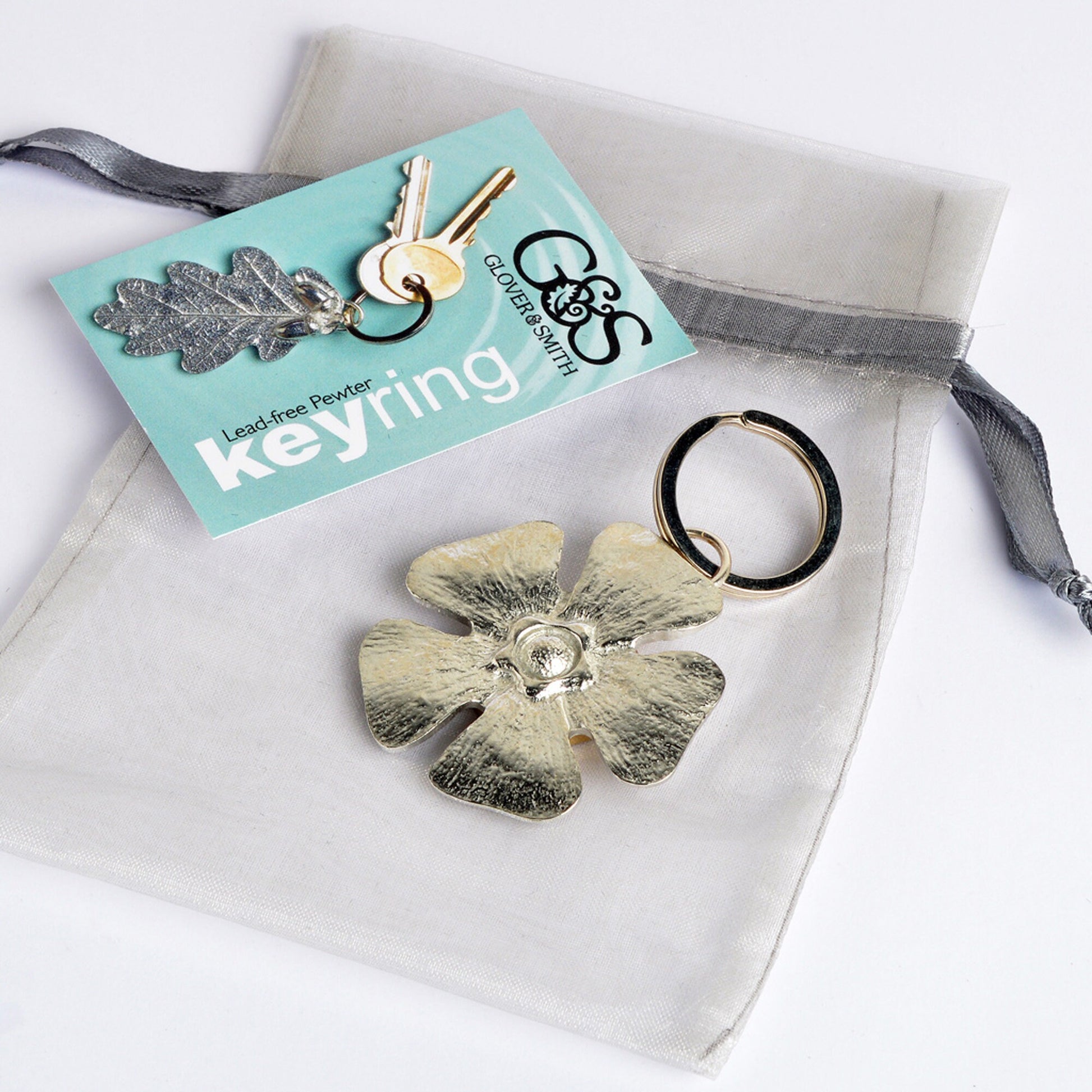 A solid pewter flower shaped keyring on a quality stainless steel ring. Love tokens, new home gifts, useful gifts, gifts for nature lovers, forget me not gifts, housewarming gifts, handmade in the UK
