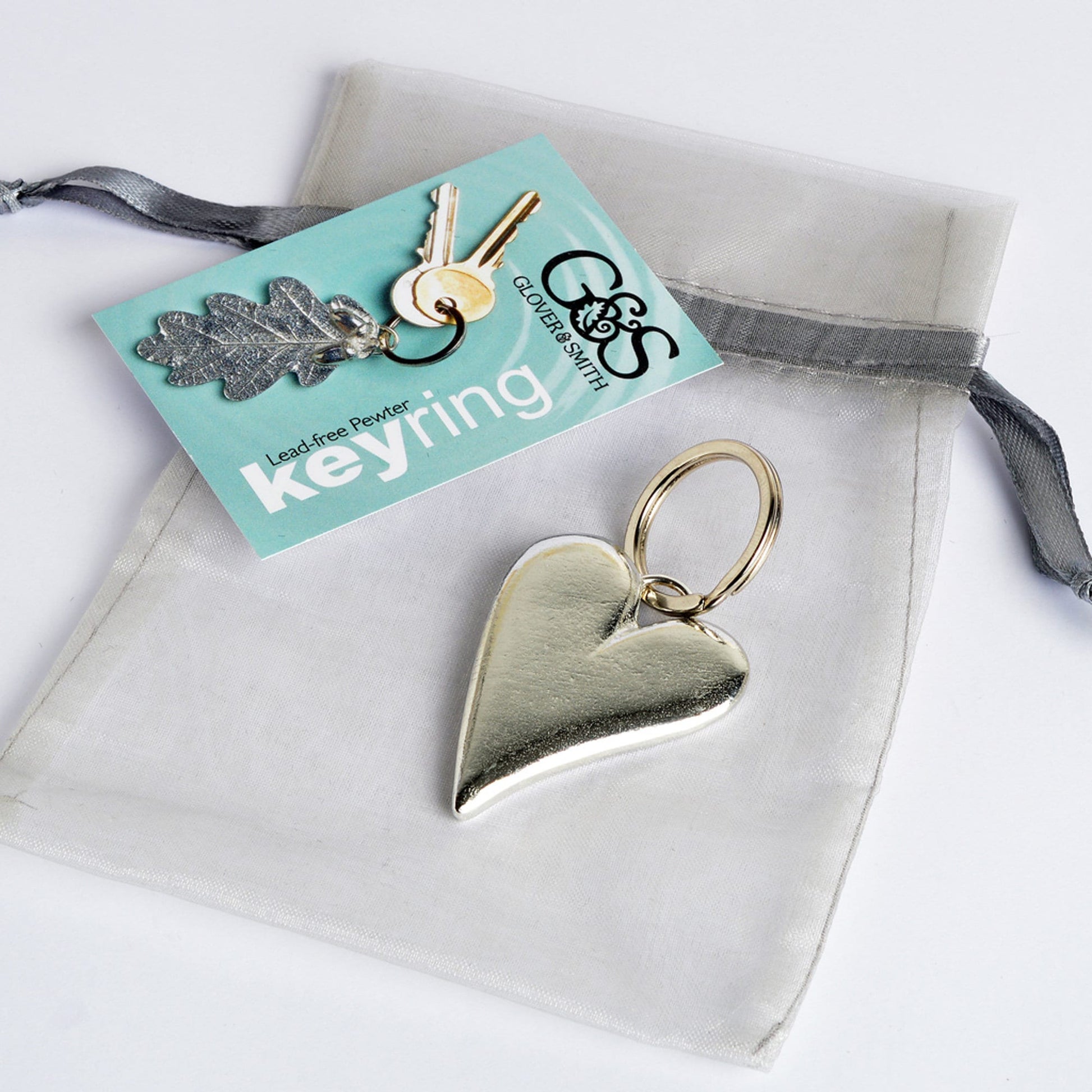 A solid pewter heart shaped keyring on a quality stainless steel ring. Love tokens, new home gifts, useful gifts, gifts for lovers, heart gifts, housewarming gifts, 10th tin ten year wedding anniversary gifts, small wedding gifts handmade in the UK