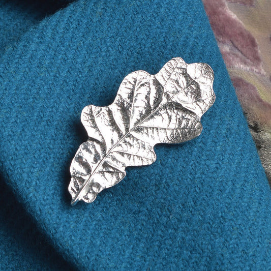 Beautifully detailed & textured oak leaf English pewter brooch, handmade in England. Oak leaf nature jewellery gifts for her. Each stunning pewter oak leaf brooch is 6.0cm (2.4 inches) tall and is attached with a metal clasp pin.
