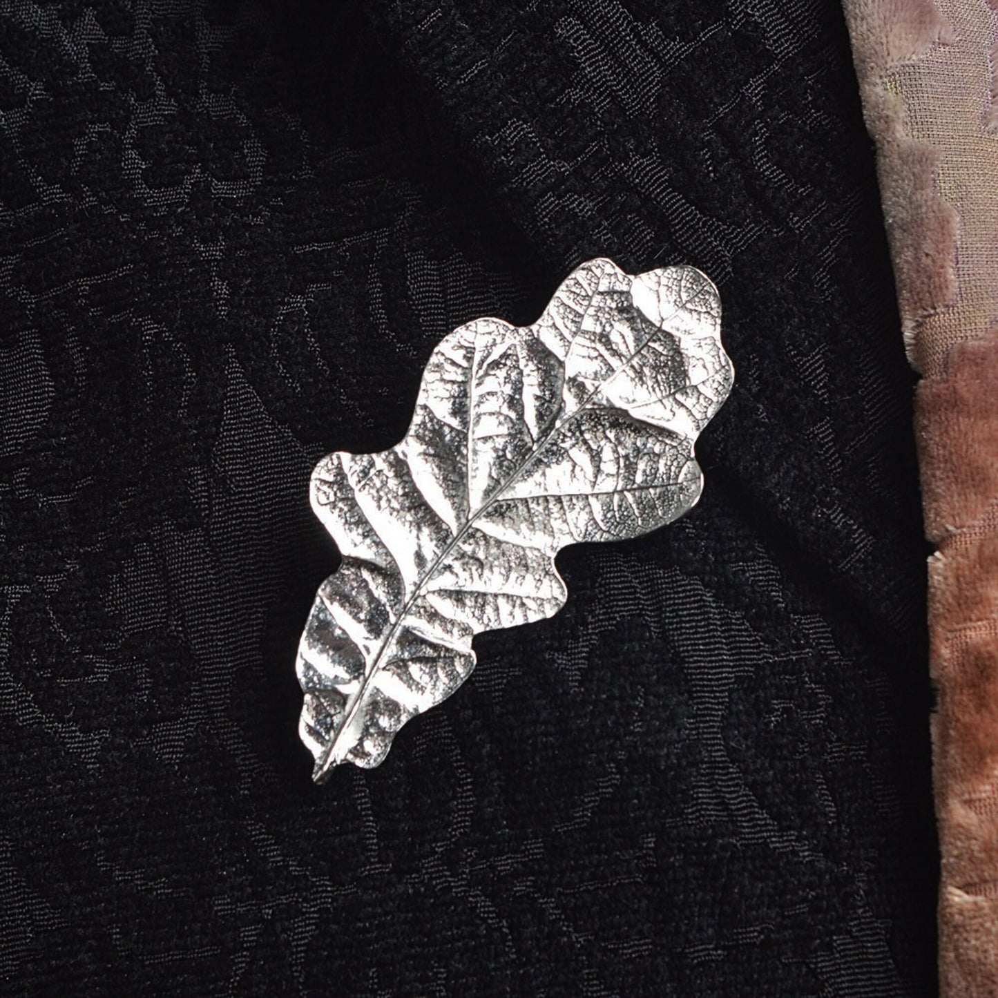 Beautifully detailed & textured oak leaf English pewter brooch, handmade in England. Oak leaf nature jewellery gifts for her. Each stunning pewter oak leaf brooch is 6.0cm (2.4 inches) tall and is attached with a metal clasp pin.