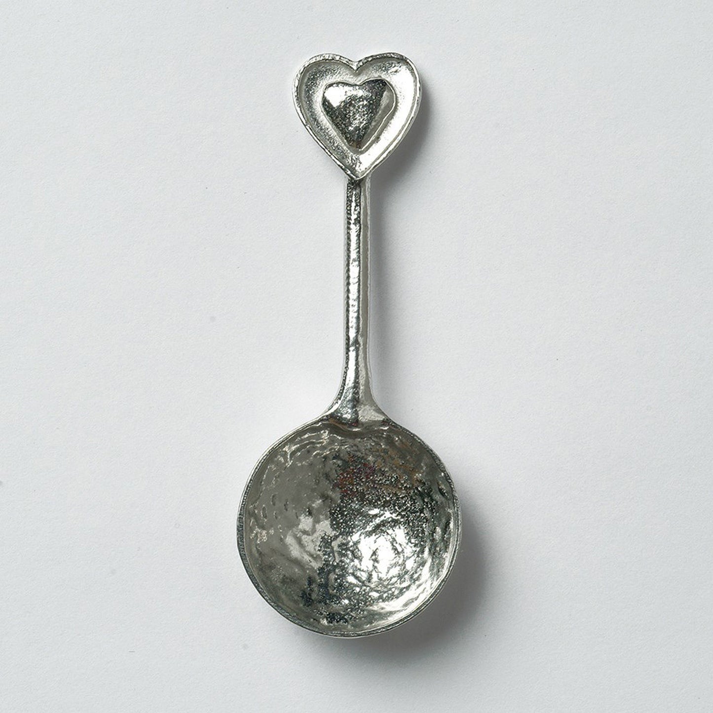 A small spoon pewter sugar spoon with 2 love hearts on the end. Our love spoon makes an ideal little love token or 10th tin wedding anniversary gift or small wedding gift.