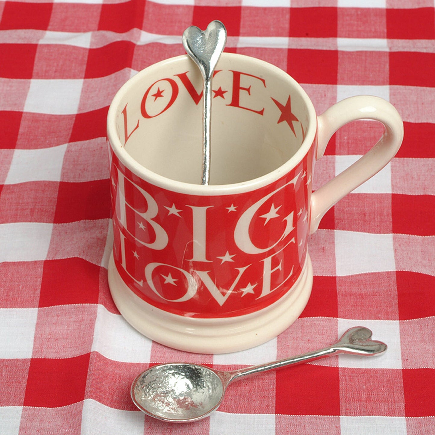 A small spoon pewter sugar teaspoon with a love heart on the end. Our love spoon makes an ideal little love token or 10th tin wedding anniversary gift or small wedding gift.