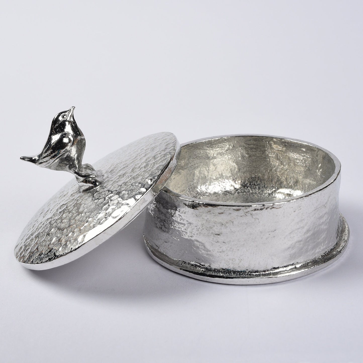 Wren pewter personalised trinket box. Our round wren keepsake box features a Jenny wren sculpture as a handle. The underside of the lid can be engraved with your personalised message.
