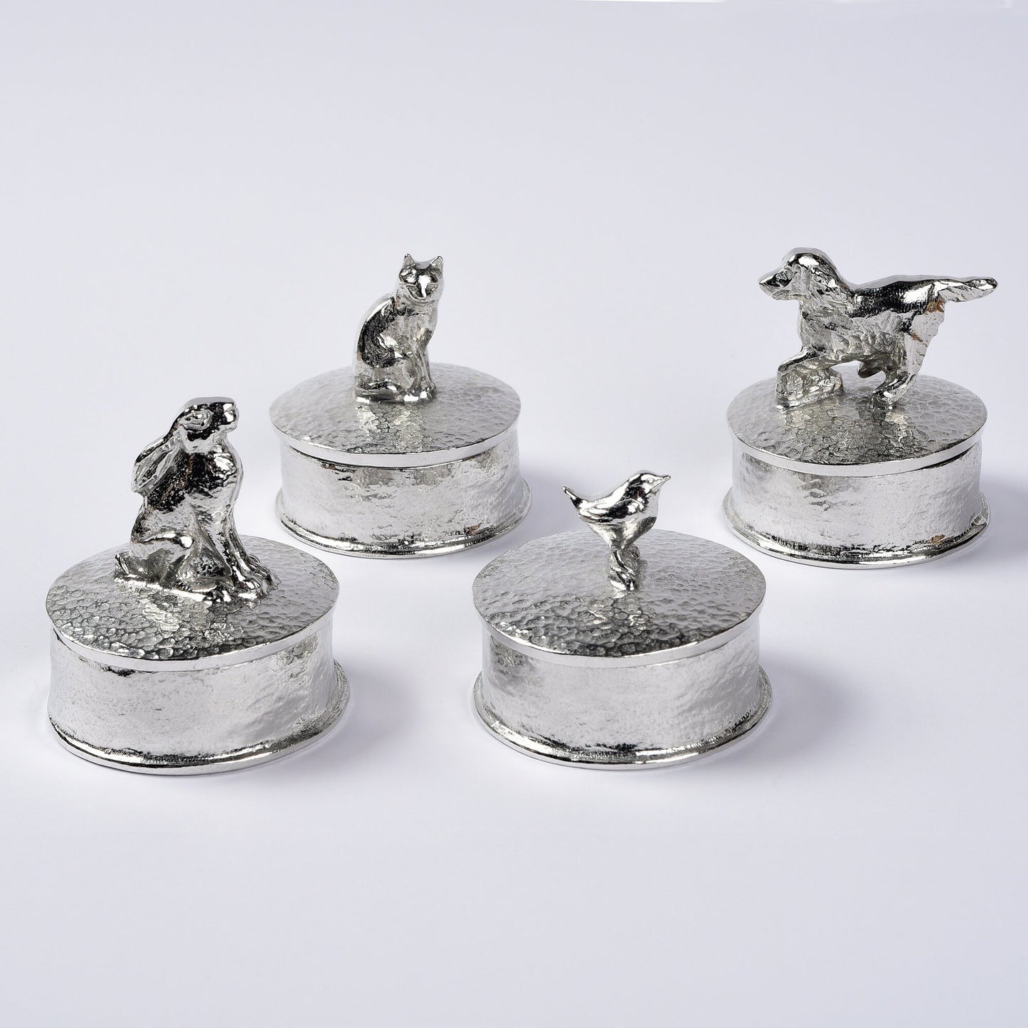 Hare pewter personalised trinket box. Our round keepsake box features a moongazing hare sculpture as a handle. The underside of the lid can be engraved with your personalised message. Hare gifts, personalised gifts for hare lovers. Country gifts.