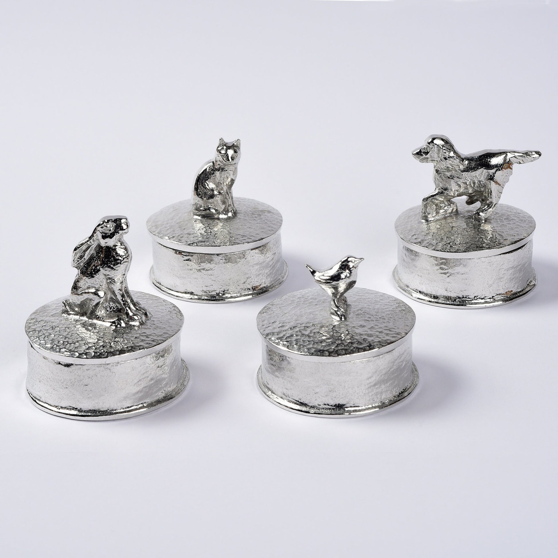 Hare pewter personalised trinket box. Our round keepsake box features a moongazing hare sculpture as a handle. The underside of the lid can be engraved with your personalised message. Hare gifts, personalised gifts for hare lovers. Country gifts.