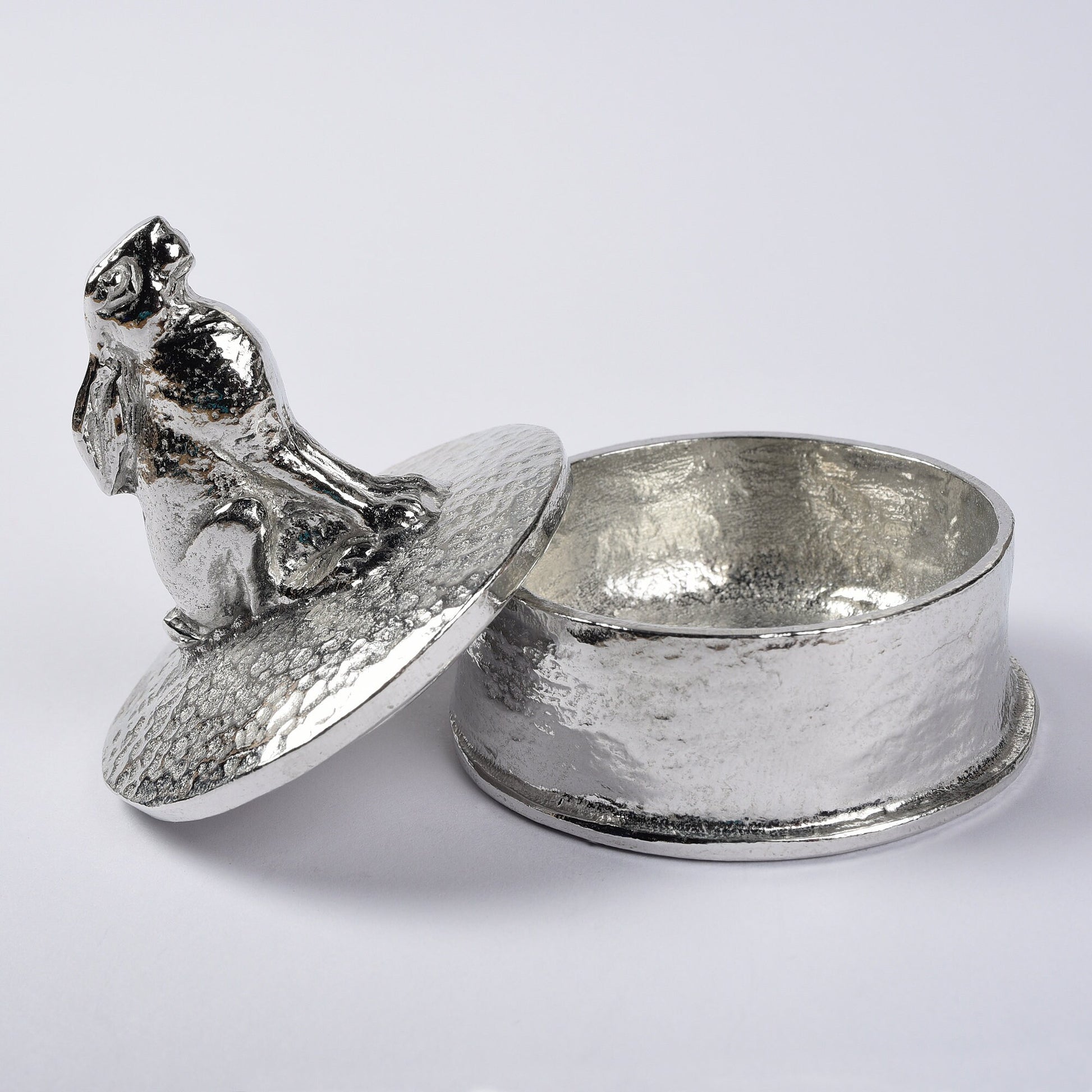 Hare pewter personalised trinket box. Our round keepsake box features a moongazing hare sculpture as a handle. The underside of the lid can be engraved with your personalised message. Hare gifts, personalised gifts for hare lovers. Country gifts.