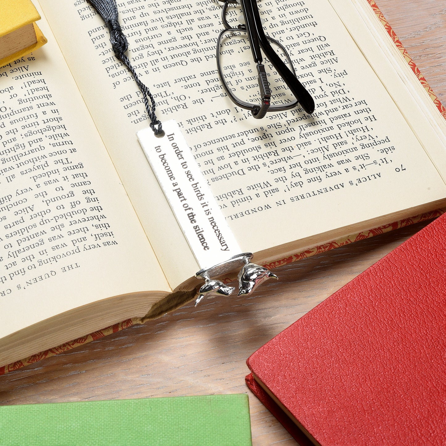 A personalised engraved pewter metal bookmark with a wren and a robin on the top. On the front the quotation 'In order to see birds it is necessary to become part of the silence'. We engrave the back with your message. Gifts for bird lovers, book lovers