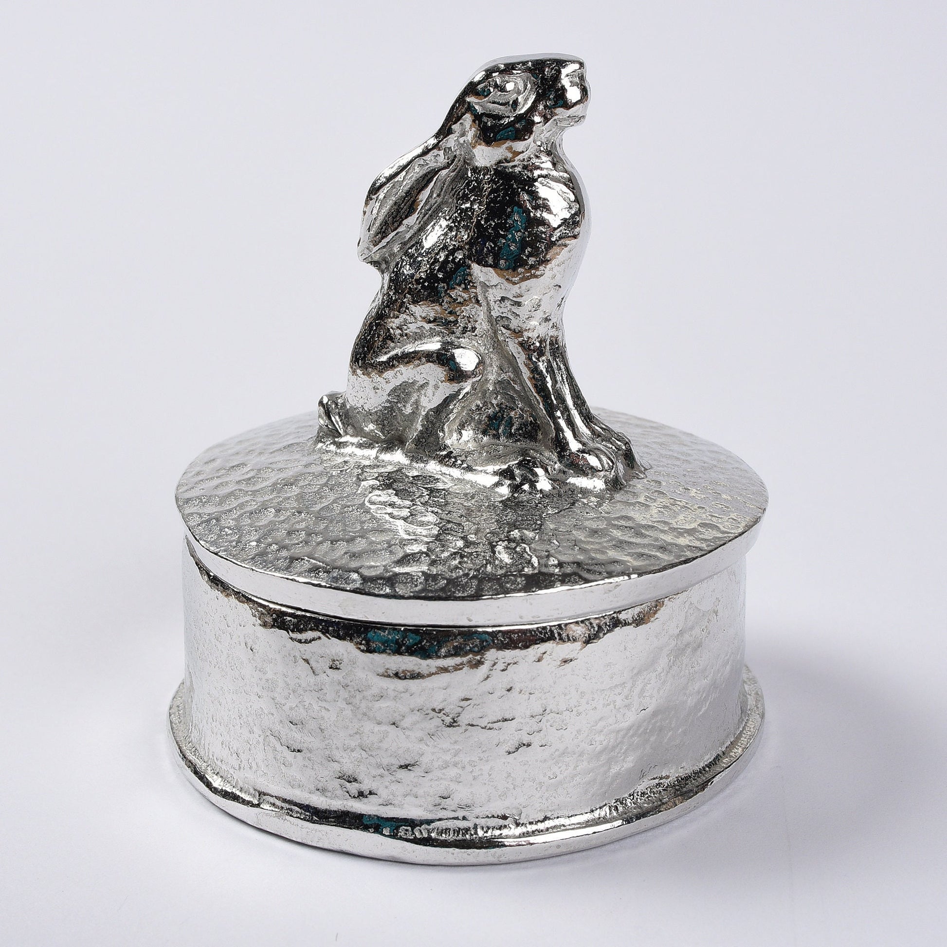 Hare pewter personalised trinket box. Our round keepsake box features a moongazing hare sculpture as a handle. The underside of the lid can be engraved with your personalised message. Hare gifts, personalised gifts for hare lovers. Country gifts.