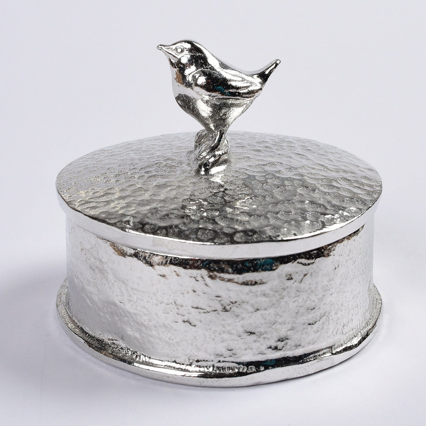 Wren pewter personalised trinket box. Our round wren keepsake box features a Jenny wren sculpture as a handle. The underside of the lid can be engraved with your personalised message.