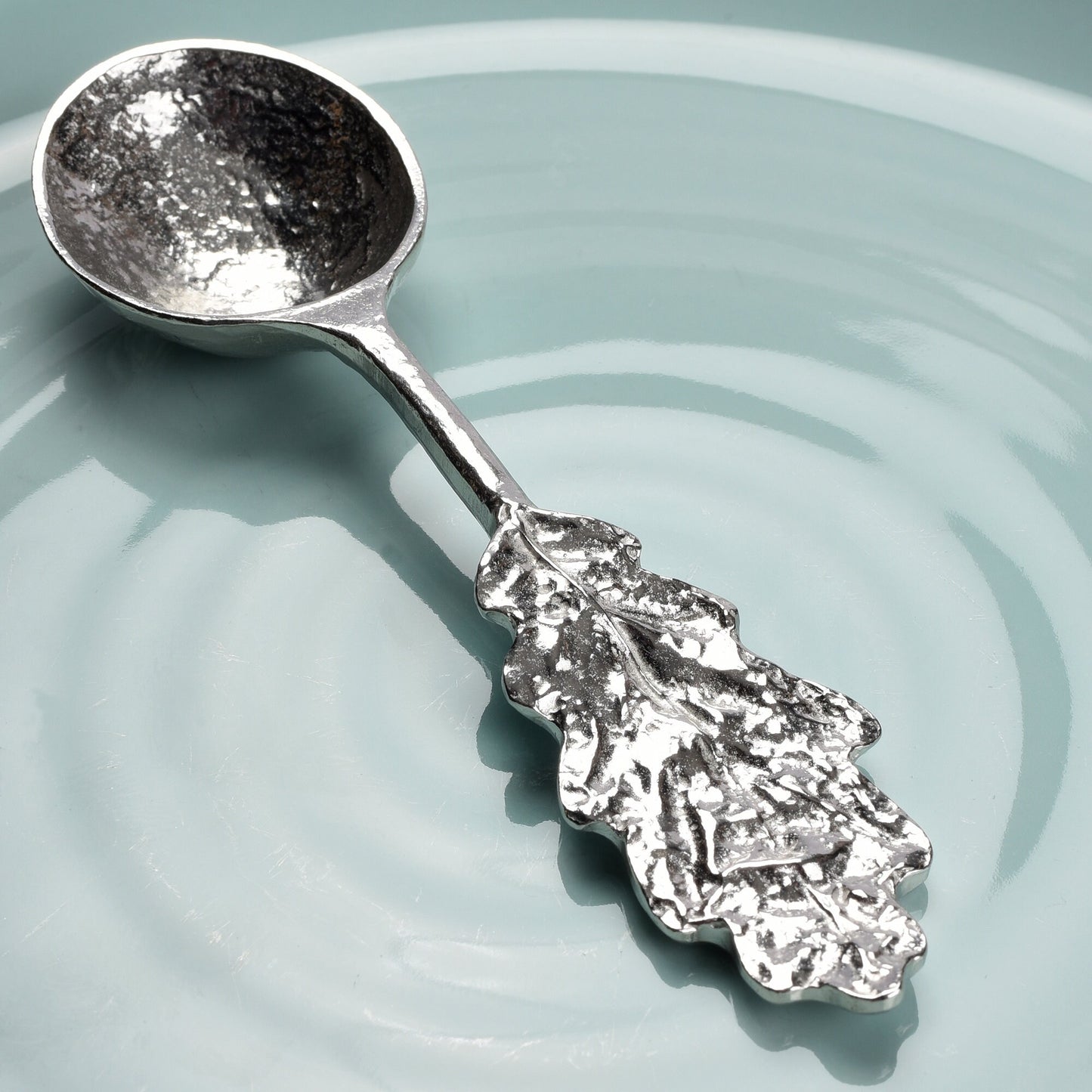 An oak leaf topped pewter spoon with the words 'From little acorns' on the reverse. Christening gifts for boys and girls. UK handmade.
