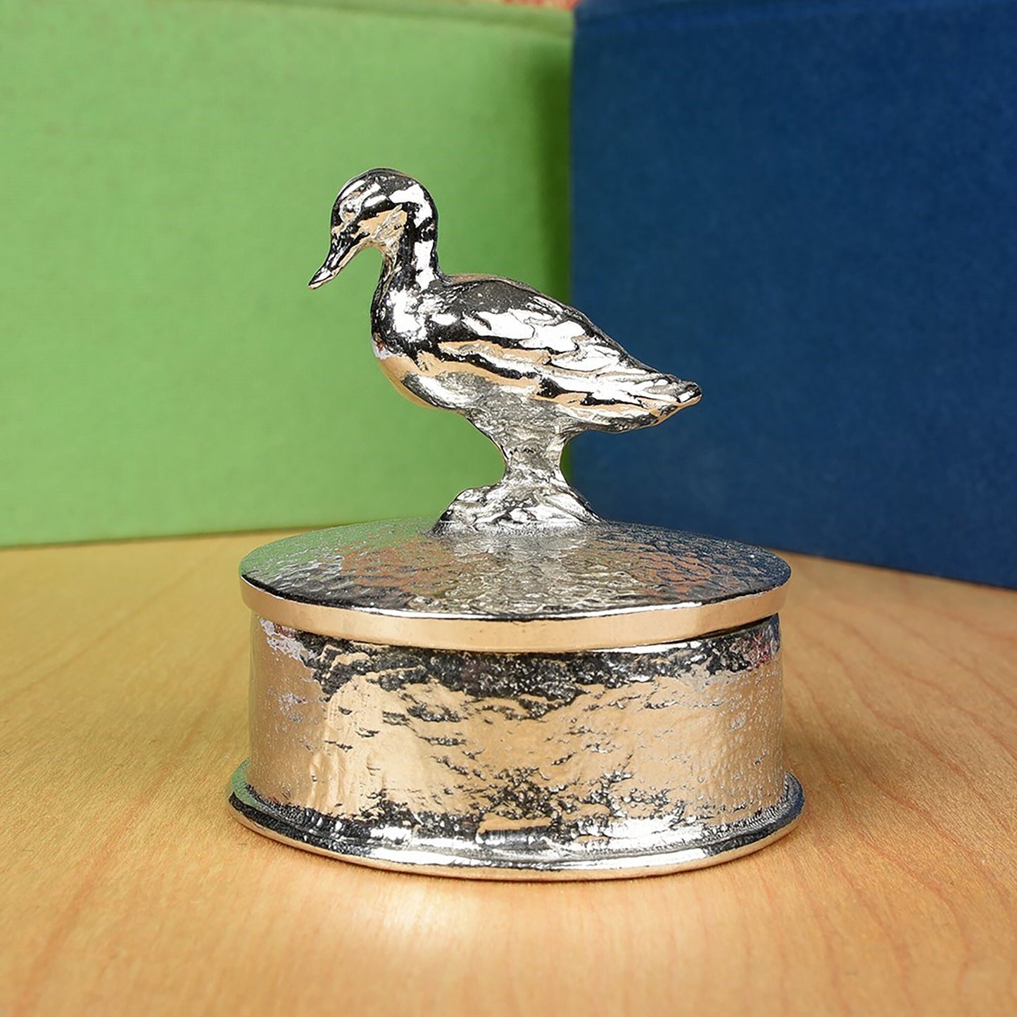 Duck pewter personalised trinket box. Our round  keepsake box features a duck sculpture as a handle. The underside of the lid can be engraved with your personalised message. A perfect 10th (Tin) ten year wedding anniversary gift (Our pewter is 95% tin)