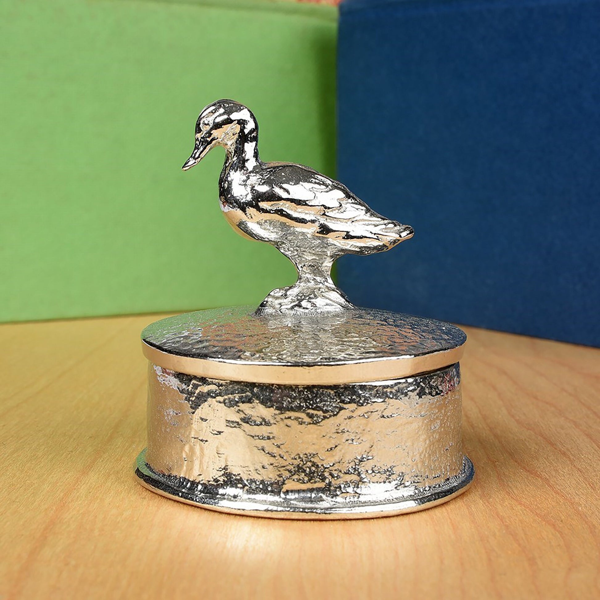 Duck pewter personalised trinket box. Our round  keepsake box features a duck sculpture as a handle. The underside of the lid can be engraved with your personalised message. A perfect 10th (Tin) ten year wedding anniversary gift (Our pewter is 95% tin)