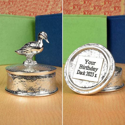 Duck pewter personalised trinket box. Our round  keepsake box features a duck sculpture as a handle. The underside of the lid can be engraved with your personalised message. A perfect 10th (Tin) ten year wedding anniversary gift (Our pewter is 95% tin)