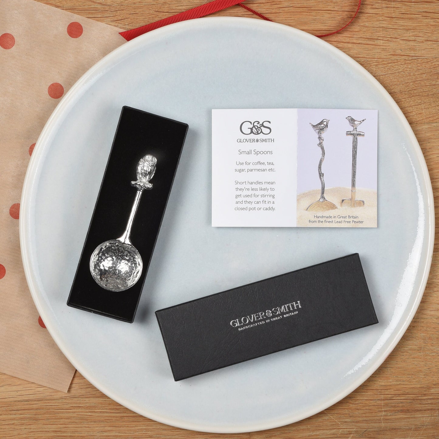 A small spoon pewter sugar spoon. A round bowled spoon on a straight handle leads to a perfectly sculpted owl. Practical & useful bird gifts for bird lovers. UK handmade
