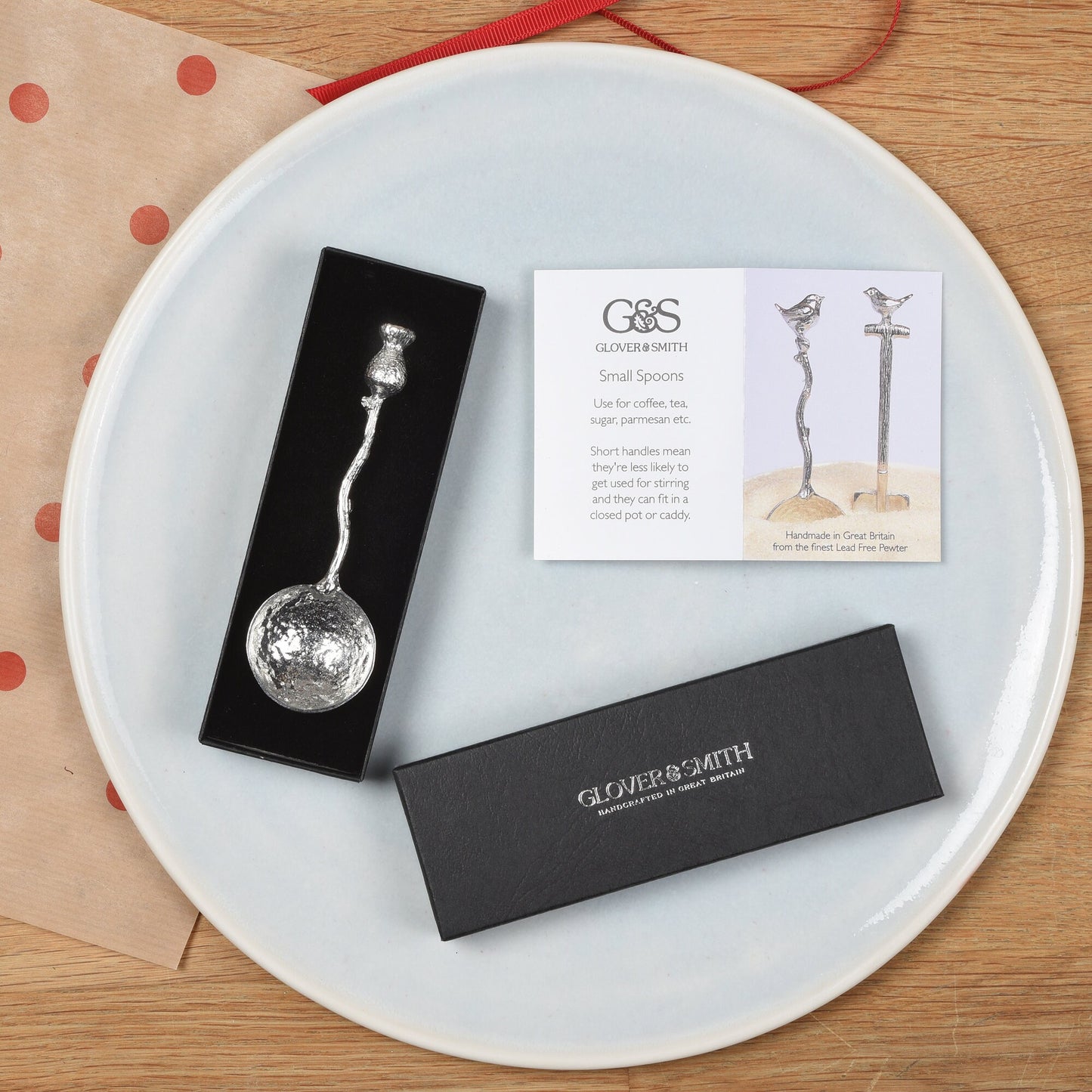 A small spoon pewter sugar spoon with a thistle on the end of a twig handle. Unusual, useful and tactile Scottish thistle gifts handmade in the UK