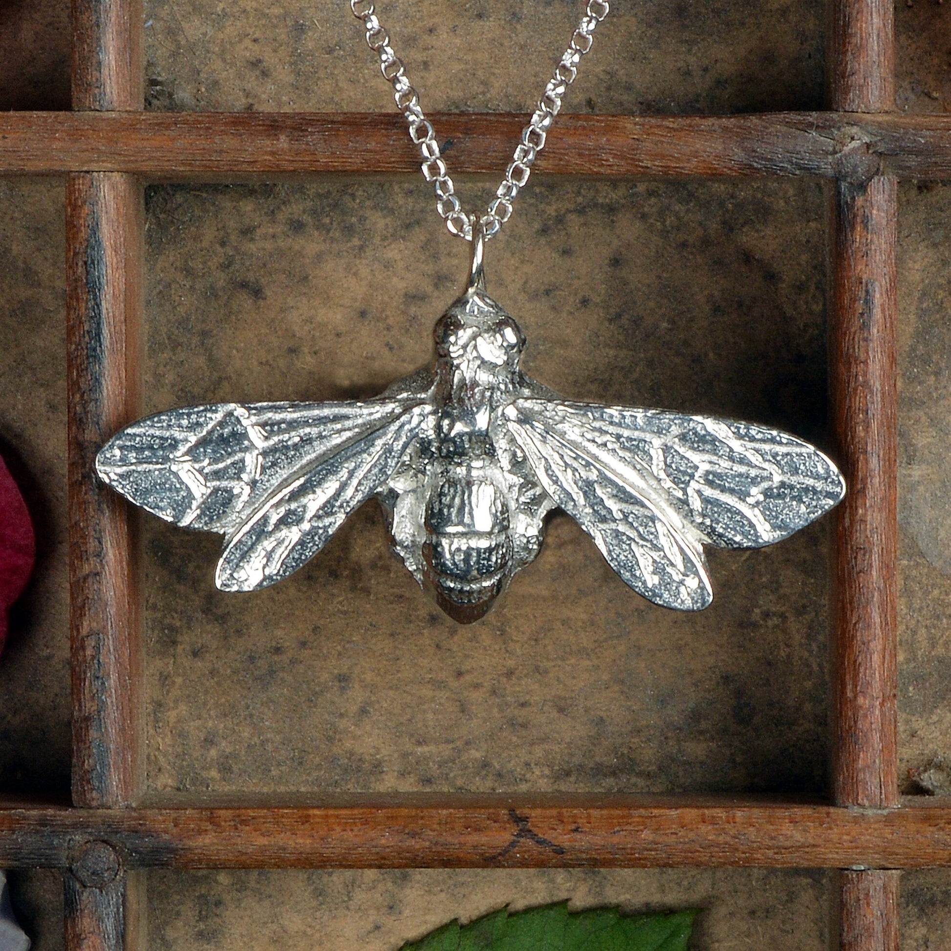 A delicate and detailed pewter larger bee necklace on an 18" Sterling silver chain. Great jewellery gifts for her, bee gifts for bee lovers. The perfect 10th tin 10 year wedding anniversary gift (Our pewter is 95% tin). Made in Britain with love.