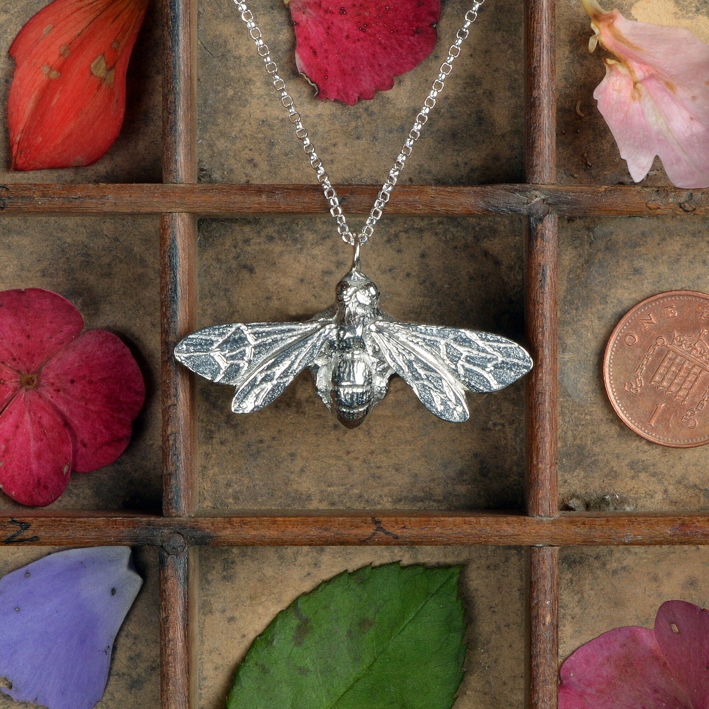 A delicate and detailed pewter larger bee necklace on an 18" Sterling silver chain. Great jewellery gifts for her, bee gifts for bee lovers. The perfect 10th tin 10 year wedding anniversary gift (Our pewter is 95% tin). Made in Britain with love.