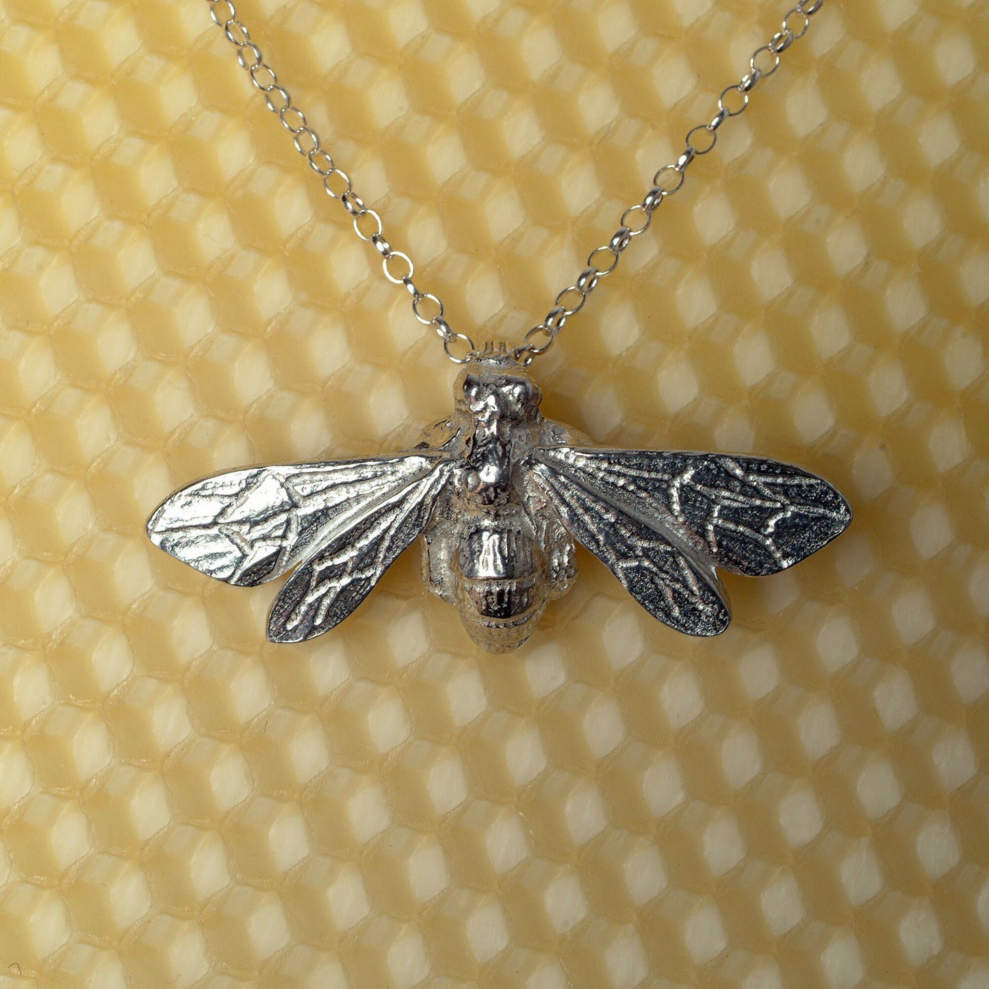 A delicate and detailed pewter larger bee necklace on an 18" Sterling silver chain. Great jewellery gifts for her, bee gifts for bee lovers. The perfect 10th tin 10 year wedding anniversary gift (Our pewter is 95% tin). Made in Britain with love.