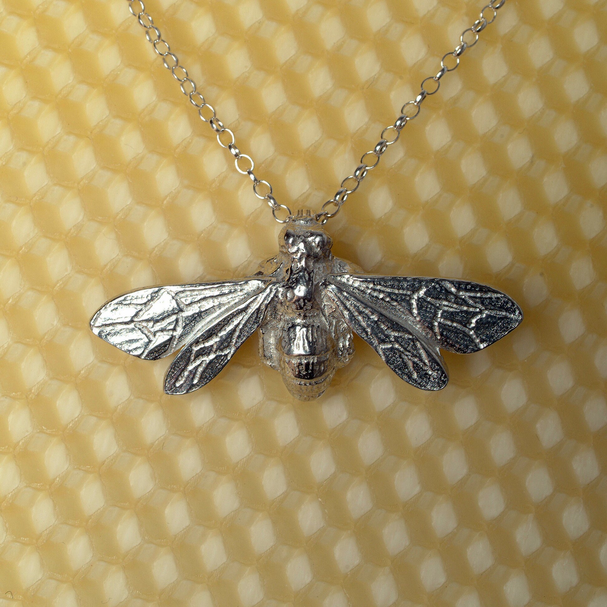 A delicate and detailed pewter larger bee necklace on an 18" Sterling silver chain. Great jewellery gifts for her, bee gifts for bee lovers. The perfect 10th tin 10 year wedding anniversary gift (Our pewter is 95% tin). Made in Britain with love.