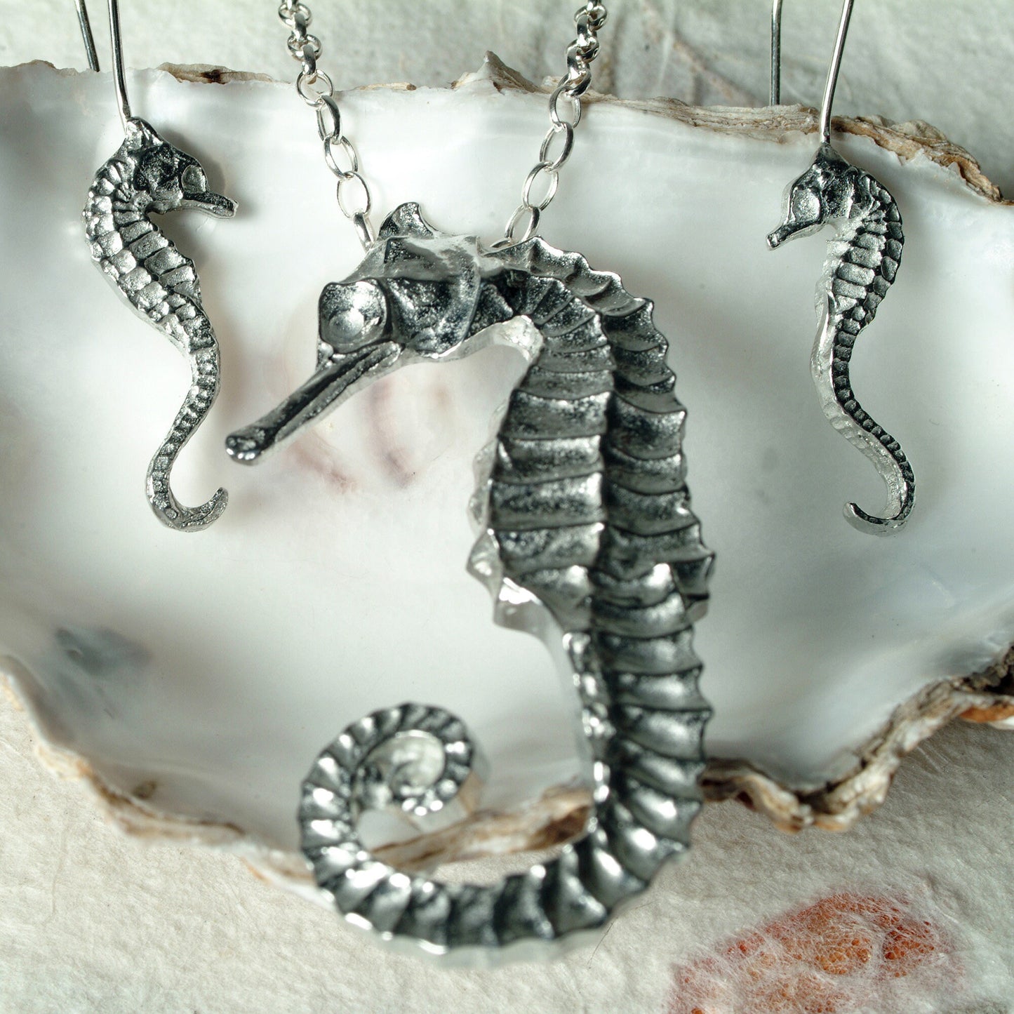 A delicate and detailed pewter seahorse necklace on an 18" Sterling silver chain. Great jewellery gifts for her, nautical gifts for seahorse lovers. The perfect 10th tin 10 year wedding anniversary gift (Our pewter is 95% tin). Made in Britain with love.