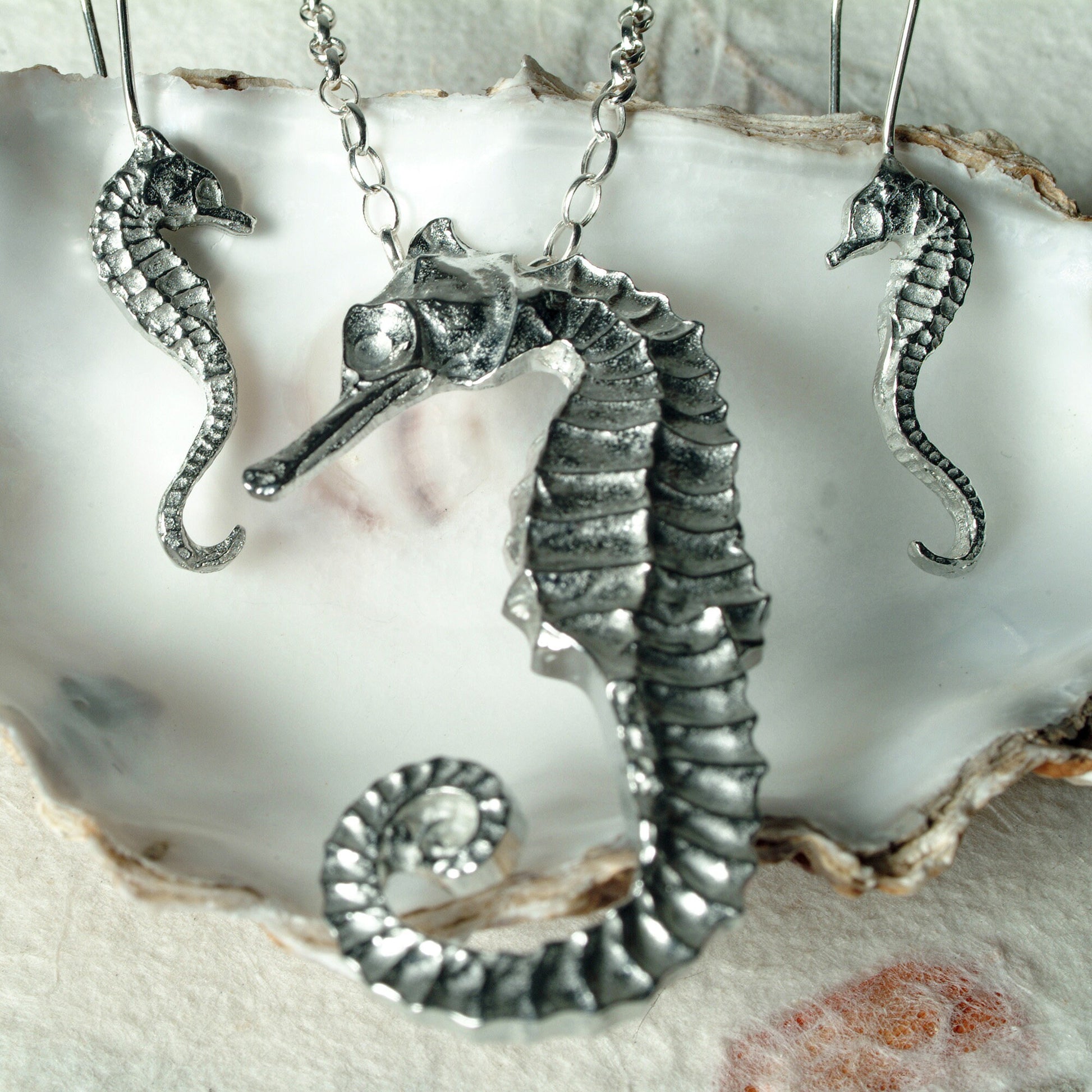 A delicate and detailed pewter seahorse necklace on an 18" Sterling silver chain. Great jewellery gifts for her, nautical gifts for seahorse lovers. The perfect 10th tin 10 year wedding anniversary gift (Our pewter is 95% tin). Made in Britain with love.