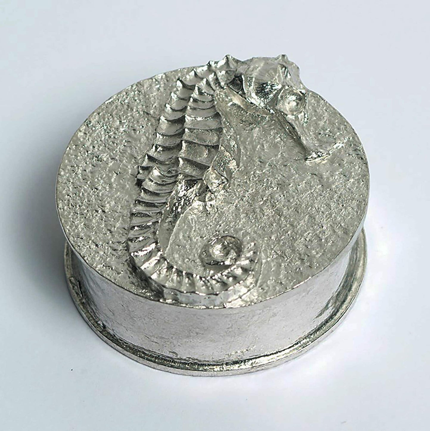 A round pewter trinket box with a seahorse on the lid. Nautical gifts for lovers of the seaside and sea life. Seahorse gifts, gifts for seahorse lovers.
