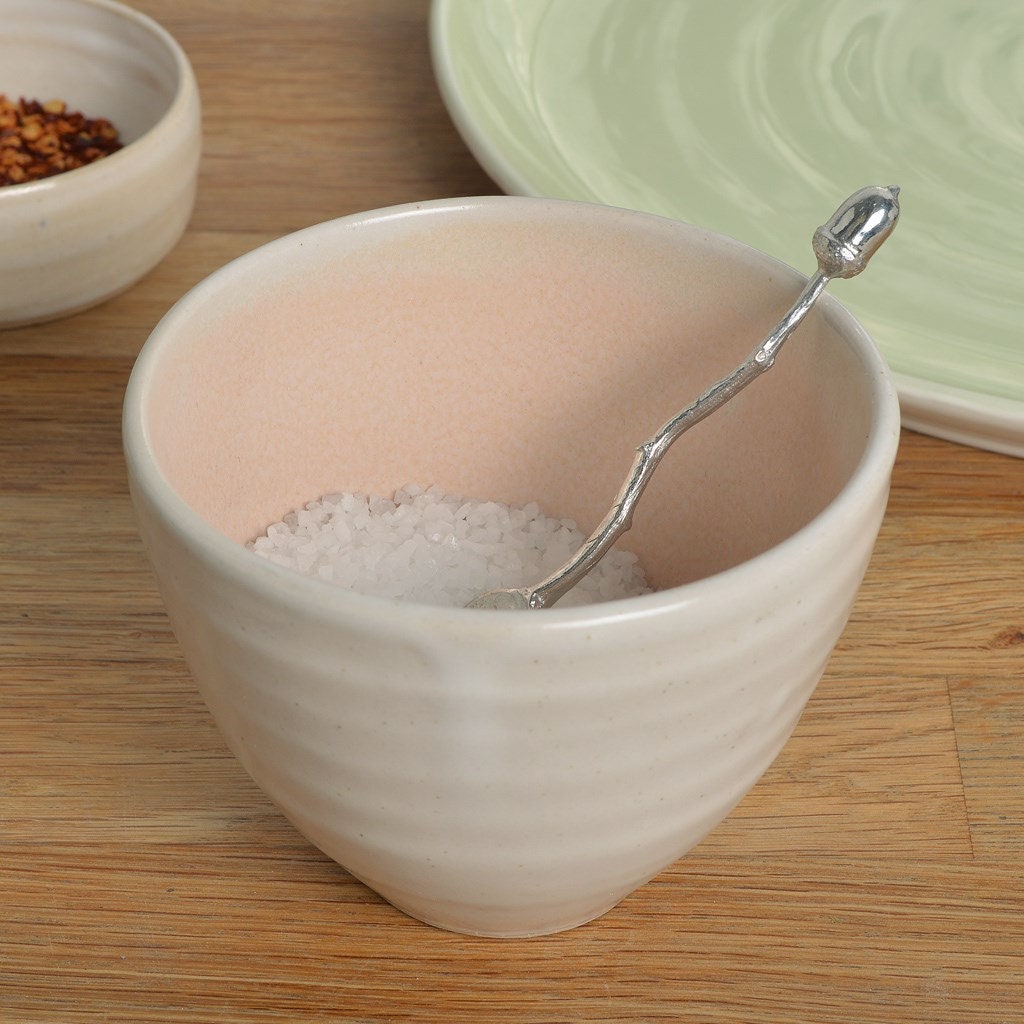 a tiny spice, salt or condiment spoon. Our pewter spoon has a small 10mm bowl leading up a fine twig textured handle to a small acorn. From little acorns gifts