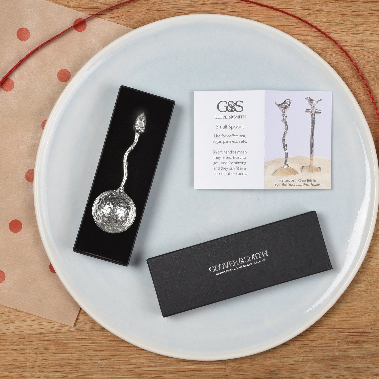 A small spoon pewter sugar spoon with an acorn on the end of a twig handle. Unusual, useful and tactile little acorn gifts handmade in the UK