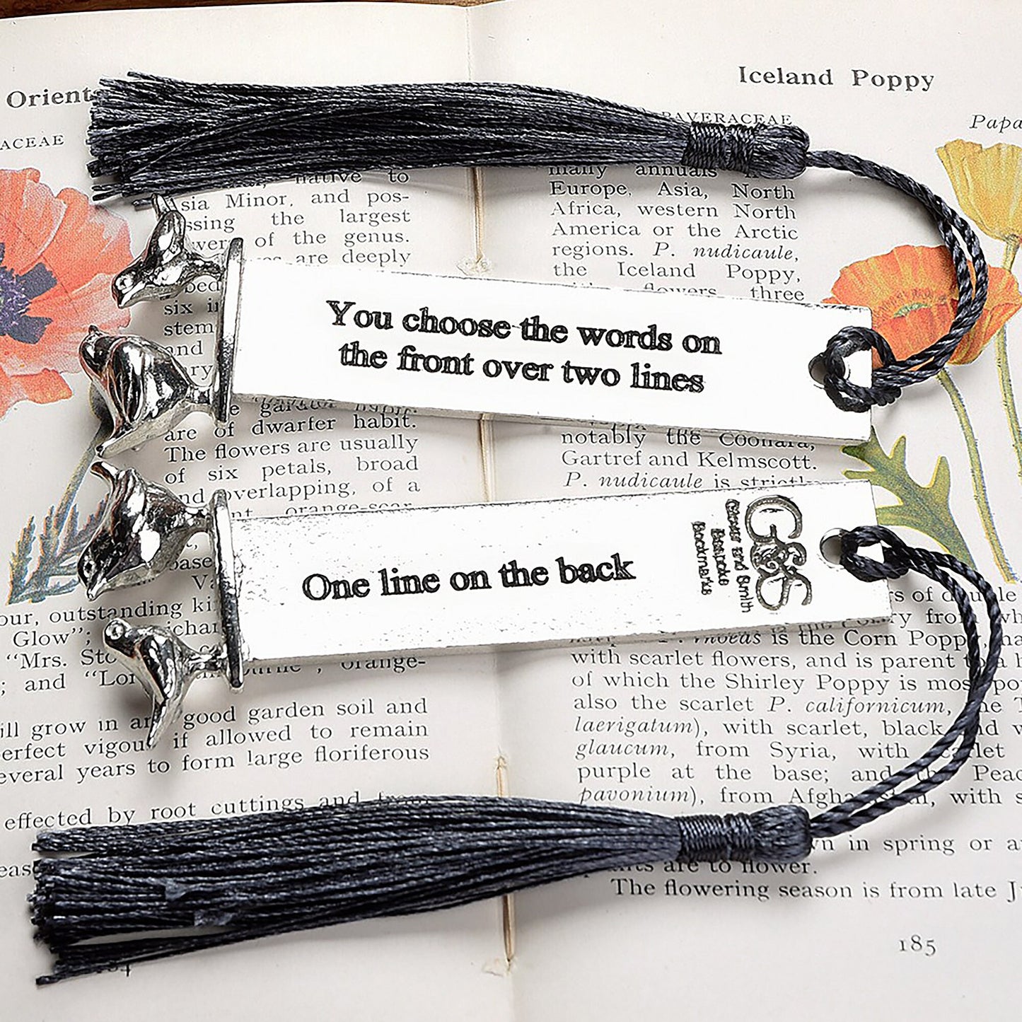A personalised engraved pewter metal bookmark with a wren and a robin on the top. We can engrave the front and the back with your own personalised messages. Unique gifts. Ideal 10th tin wedding anniversary gift. Our pewter is 95% tin.