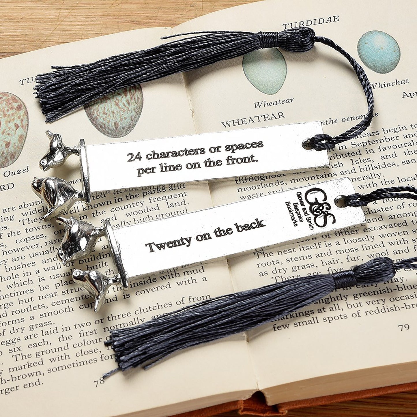 A personalised engraved pewter metal bookmark with a wren and a robin on the top. We can engrave the front and the back with your own personalised messages. Unique gifts. Ideal 10th tin wedding anniversary gift. Our pewter is 95% tin.