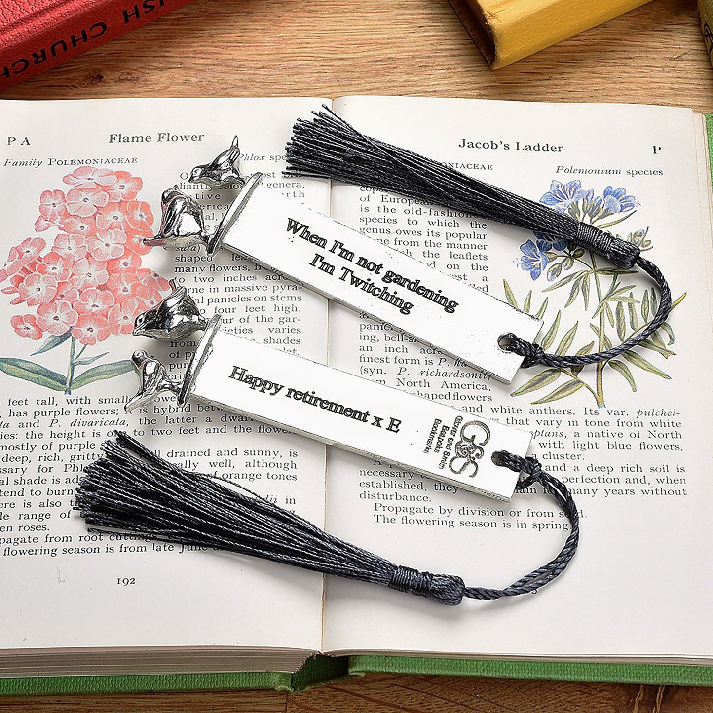 A personalised engraved pewter metal bookmark with a wren and a robin on the top. We can engrave the front and the back with your own personalised messages. Unique gifts. Ideal 10th tin wedding anniversary gift. Our pewter is 95% tin.