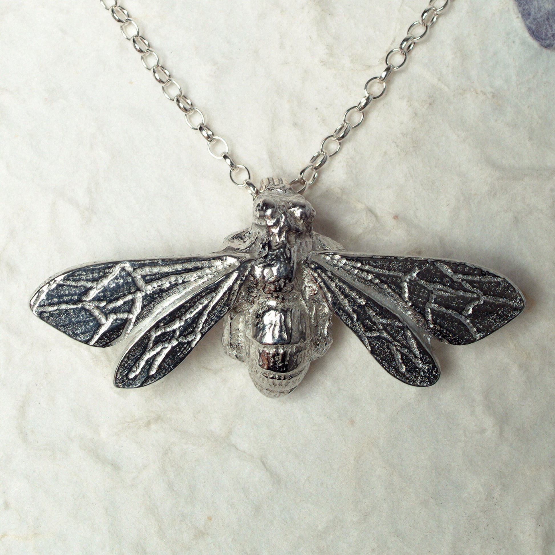 A delicate and detailed pewter larger bee necklace on an 18" Sterling silver chain. Great jewellery gifts for her, bee gifts for bee lovers. The perfect 10th tin 10 year wedding anniversary gift (Our pewter is 95% tin). Made in Britain with love.